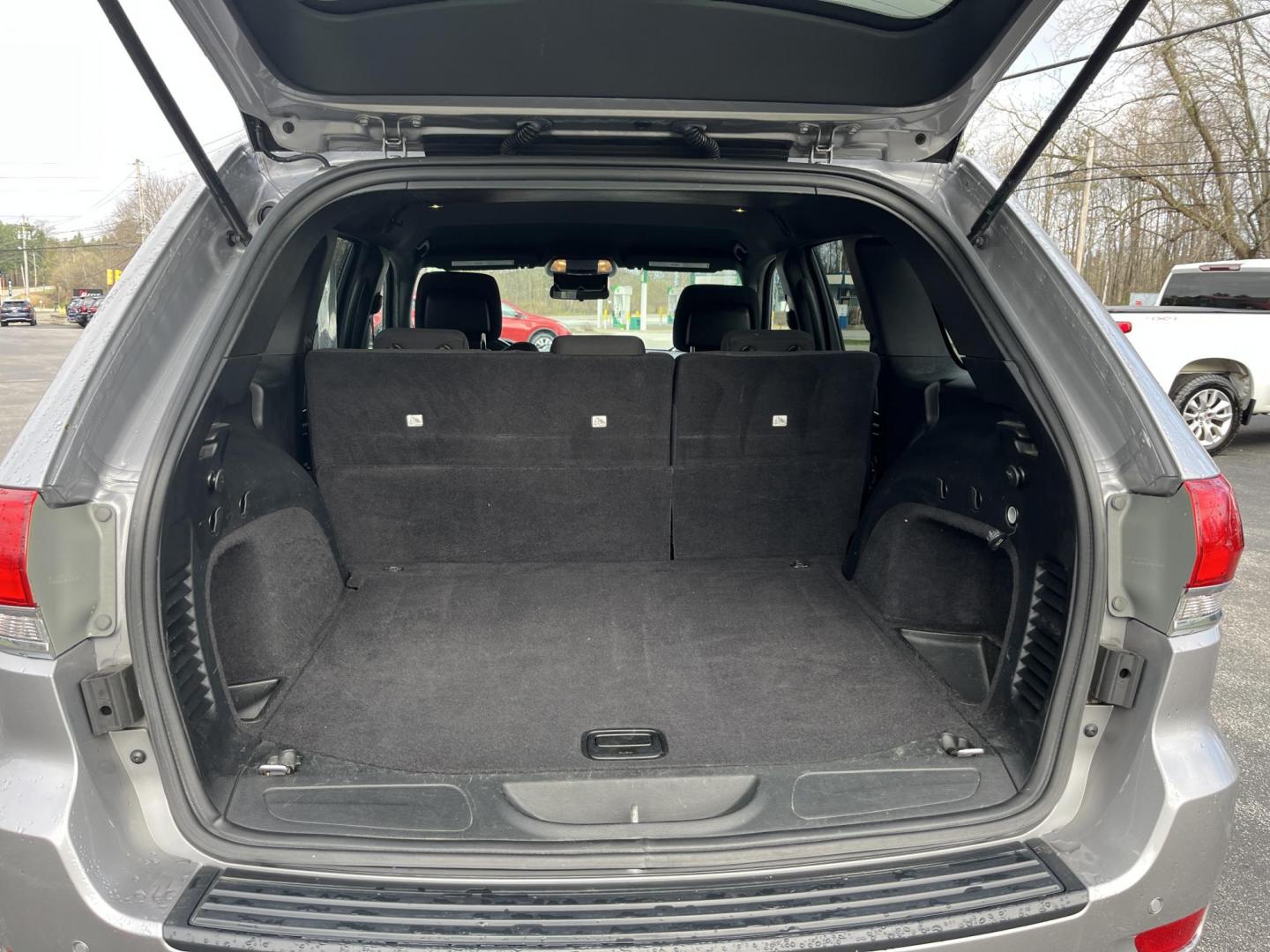 2018 Silver /Black Jeep Grand Cherokee Laredo 4WD (1C4RJFAG9JC) with an 3.6L V6 DOHC 24V engine, Automatic transmission, located at 11115 Chardon Rd. , Chardon, OH, 44024, (440) 214-9705, 41.580246, -81.241943 - 2018 Jeep Grand Cherokee Laredo E 4WD – Clean, Capable, and Well-Equipped! This 2018 Jeep Grand Cherokee Laredo E 4WD is a sharp, versatile midsize SUV that offers great value with solid capability and modern features. Powered by the smooth 3.6L Pentastar V6 engine paired with an 8-speed automati - Photo#14