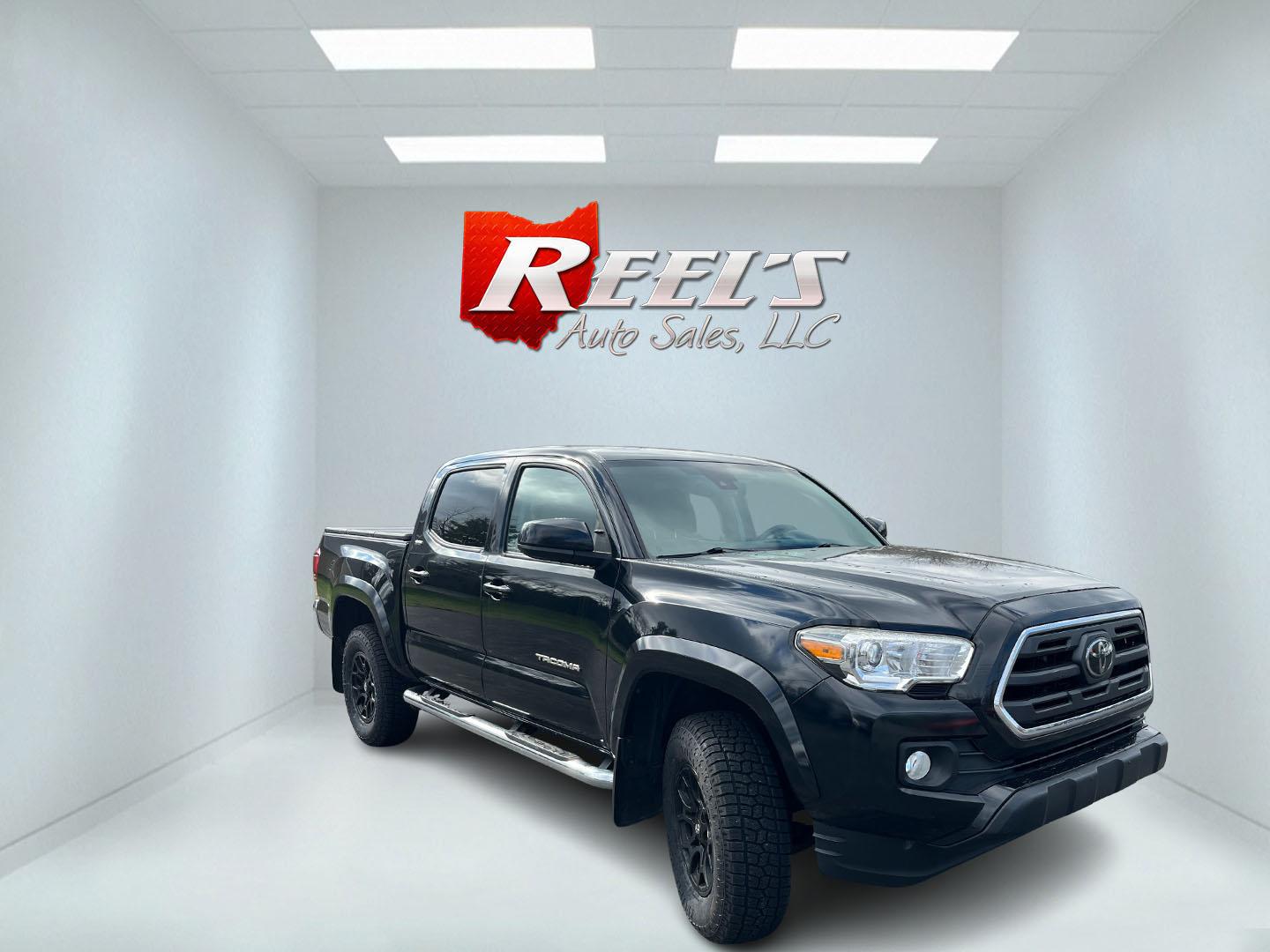 2019 Black /Black Toyota Tacoma SR5 Double Cab Short Bed V6 6AT 4WD (3TMCZ5AN5KM) with an 3.6L V6 DOHC 24V engine, Automatic transmission, located at 11115 Chardon Rd. , Chardon, OH, 44024, (440) 214-9705, 41.580246, -81.241943 - 2019 Toyota Tacoma SR5 Crew Cab 4WD – Rugged, Reliable, and Loaded with Toyota Safety Sense! This 2019 Toyota Tacoma SR5 Crew Cab 4WD is a clean, capable midsize truck that’s built to last and ready for work or weekend adventures! Powered by the strong 3.5L D-4S V6 engine paired with a smooth 6 - Photo#2