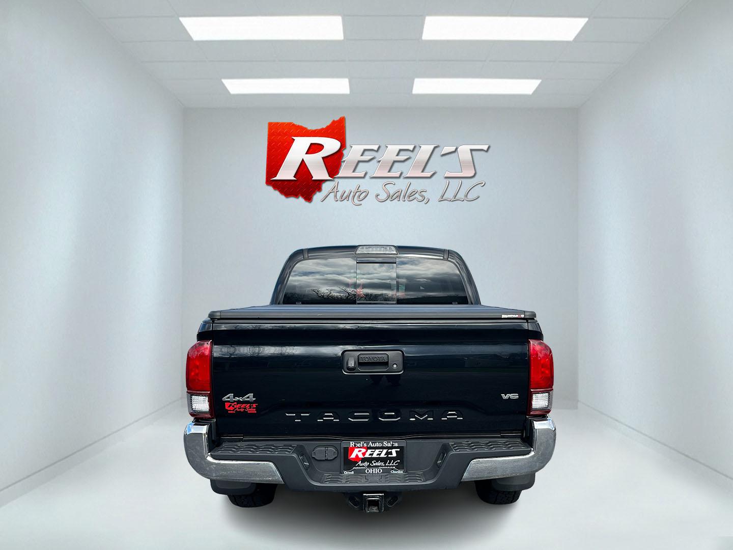 2019 Black /Black Toyota Tacoma SR5 Double Cab Short Bed V6 6AT 4WD (3TMCZ5AN5KM) with an 3.6L V6 DOHC 24V engine, Automatic transmission, located at 11115 Chardon Rd. , Chardon, OH, 44024, (440) 214-9705, 41.580246, -81.241943 - 2019 Toyota Tacoma SR5 Crew Cab 4WD – Rugged, Reliable, and Loaded with Toyota Safety Sense! This 2019 Toyota Tacoma SR5 Crew Cab 4WD is a clean, capable midsize truck that’s built to last and ready for work or weekend adventures! Powered by the strong 3.5L D-4S V6 engine paired with a smooth 6 - Photo#8