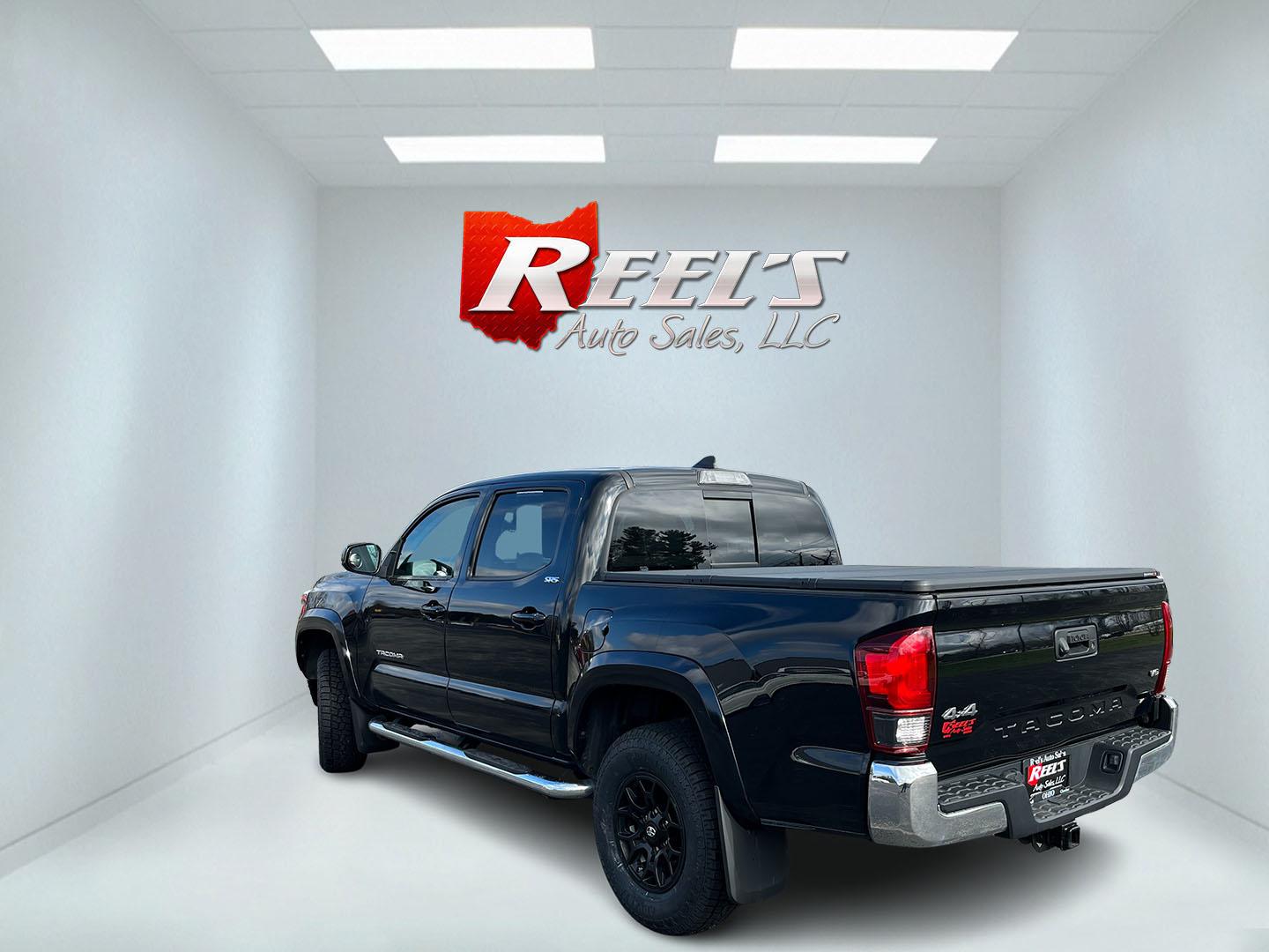 2019 Black /Black Toyota Tacoma SR5 Double Cab Short Bed V6 6AT 4WD (3TMCZ5AN5KM) with an 3.6L V6 DOHC 24V engine, Automatic transmission, located at 11115 Chardon Rd. , Chardon, OH, 44024, (440) 214-9705, 41.580246, -81.241943 - 2019 Toyota Tacoma SR5 Crew Cab 4WD – Rugged, Reliable, and Loaded with Toyota Safety Sense! This 2019 Toyota Tacoma SR5 Crew Cab 4WD is a clean, capable midsize truck that’s built to last and ready for work or weekend adventures! Powered by the strong 3.5L D-4S V6 engine paired with a smooth 6 - Photo#9