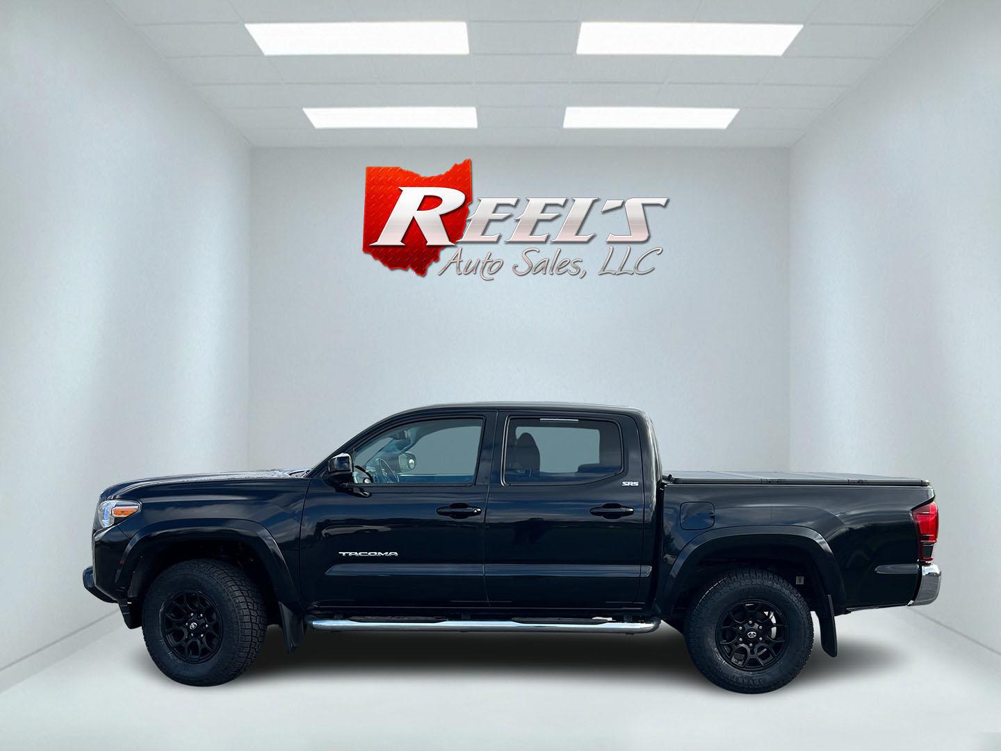 2019 Black /Black Toyota Tacoma SR5 Double Cab Short Bed V6 6AT 4WD (3TMCZ5AN5KM) with an 3.6L V6 DOHC 24V engine, Automatic transmission, located at 11115 Chardon Rd. , Chardon, OH, 44024, (440) 214-9705, 41.580246, -81.241943 - 2019 Toyota Tacoma SR5 Crew Cab 4WD – Rugged, Reliable, and Loaded with Toyota Safety Sense! This 2019 Toyota Tacoma SR5 Crew Cab 4WD is a clean, capable midsize truck that’s built to last and ready for work or weekend adventures! Powered by the strong 3.5L D-4S V6 engine paired with a smooth 6 - Photo#11