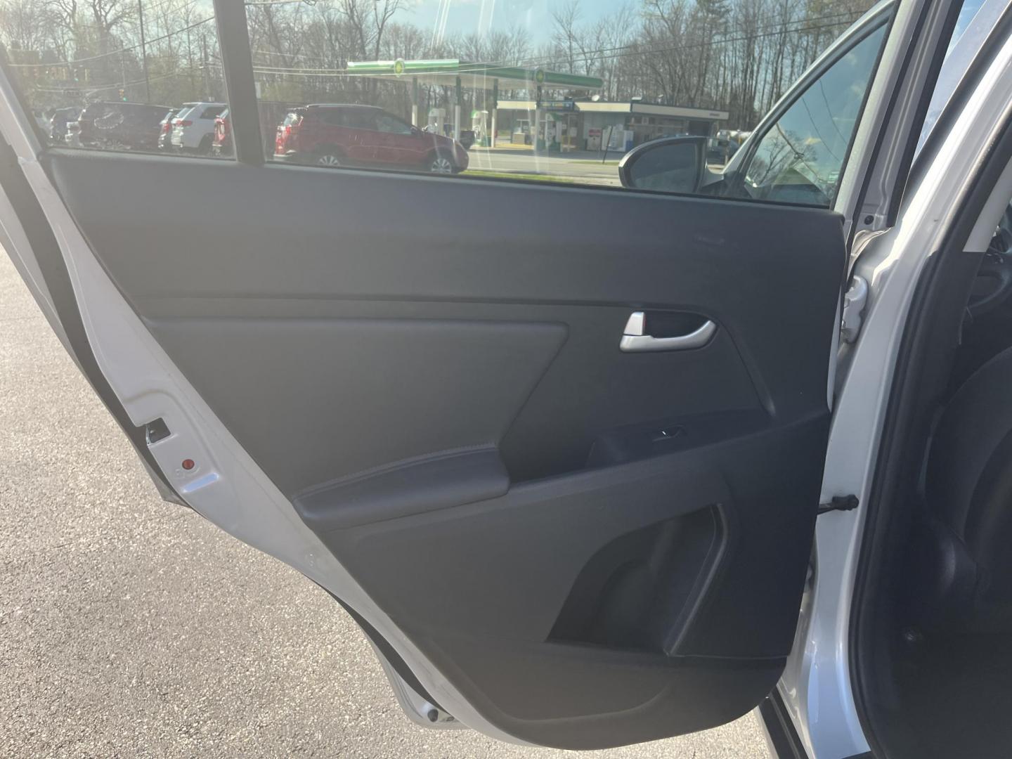 2016 Silver /Black Kia Sportage LX FWD (KNDPB3AC3G7) with an 2.4L I4 DOHC 24V engine, 6-Speed Automatic transmission, located at 11115 Chardon Rd. , Chardon, OH, 44024, (440) 214-9705, 41.580246, -81.241943 - 2016 Kia Sportage LX FWD – Efficient, Reliable, and Ready for Daily Driving! This clean 2016 Kia Sportage LX FWD is a sharp, practical compact SUV that offers great value and solid efficiency! Powered by a smooth 2.4L I4 GDI engine paired with a responsive 6-speed automatic transmission, it deliv - Photo#27