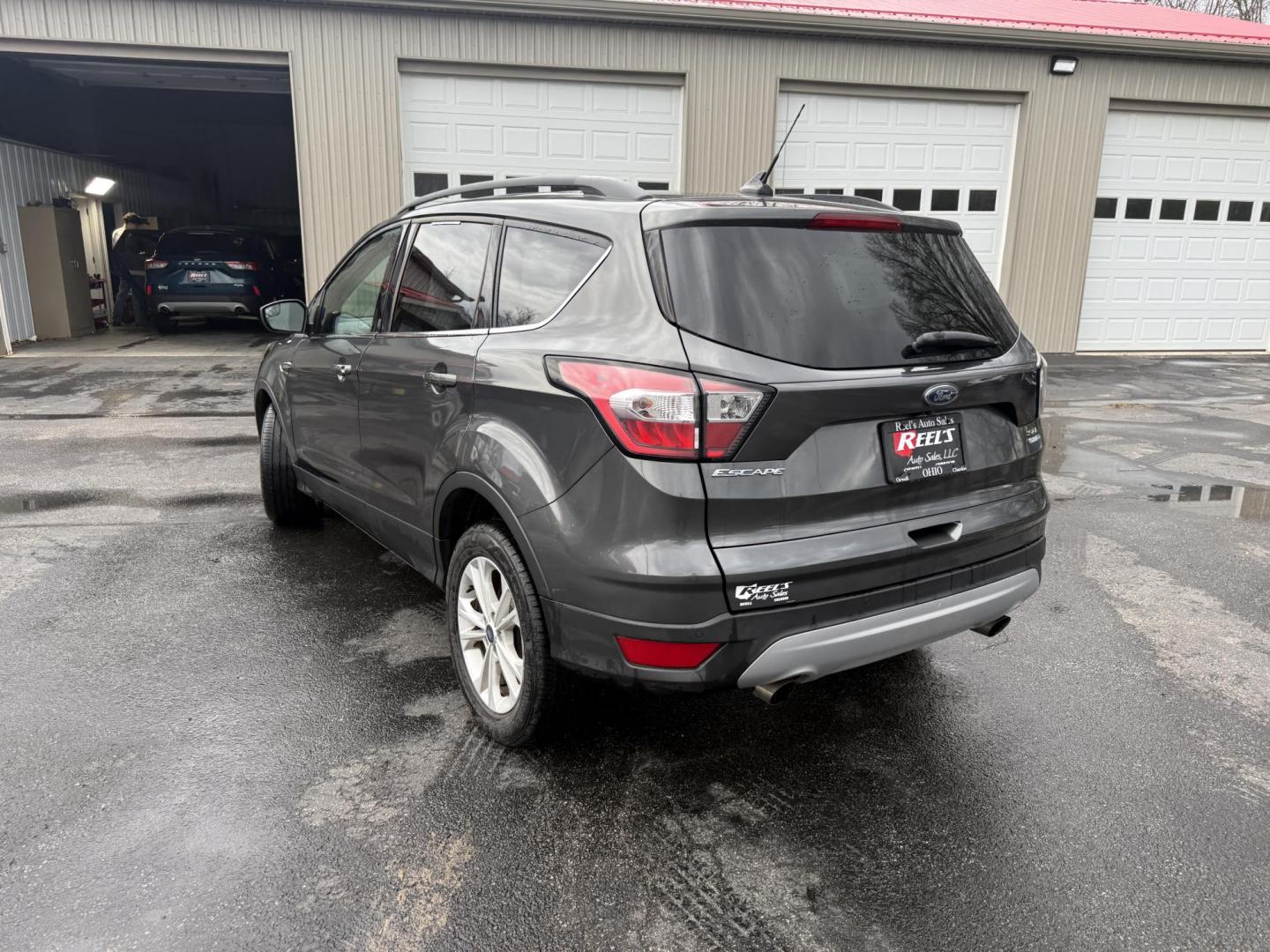 2018 Gray /Black Ford Escape SEL 4WD (1FMCU9HD0JU) with an 1.5L I4 DOHC 16V engine, Automatic transmission, located at 11115 Chardon Rd. , Chardon, OH, 44024, (440) 214-9705, 41.580246, -81.241943 - 2018 Ford Escape SEL 4WD – Turbo Efficiency, Premium Comfort, and All-Weather Confidence! This sharp 2018 Ford Escape SEL 4WD is a great-looking compact crossover that delivers style, comfort, and real capability! Powered by a responsive 1.5L I4 Turbocharged EcoBoost engine paired with a smooth 6 - Photo#31