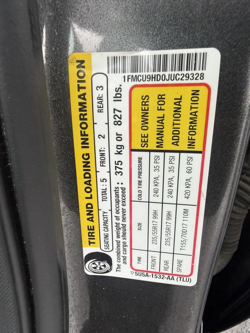 2018 Gray /Black Ford Escape SEL 4WD (1FMCU9HD0JU) with an 1.5L I4 DOHC 16V engine, Automatic transmission, located at 11115 Chardon Rd. , Chardon, OH, 44024, (440) 214-9705, 41.580246, -81.241943 - 2018 Ford Escape SEL 4WD – Turbo Efficiency, Premium Comfort, and All-Weather Confidence! This sharp 2018 Ford Escape SEL 4WD is a great-looking compact crossover that delivers style, comfort, and real capability! Powered by a responsive 1.5L I4 Turbocharged EcoBoost engine paired with a smooth 6 - Photo#37