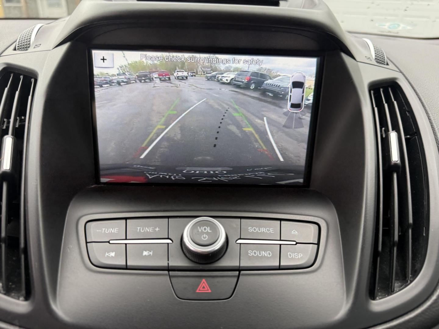 2018 Gray /Black Ford Escape SEL 4WD (1FMCU9HD0JU) with an 1.5L I4 DOHC 16V engine, Automatic transmission, located at 11115 Chardon Rd. , Chardon, OH, 44024, (440) 214-9705, 41.580246, -81.241943 - 2018 Ford Escape SEL 4WD – Turbo Efficiency, Premium Comfort, and All-Weather Confidence! This sharp 2018 Ford Escape SEL 4WD is a great-looking compact crossover that delivers style, comfort, and real capability! Powered by a responsive 1.5L I4 Turbocharged EcoBoost engine paired with a smooth 6 - Photo#14