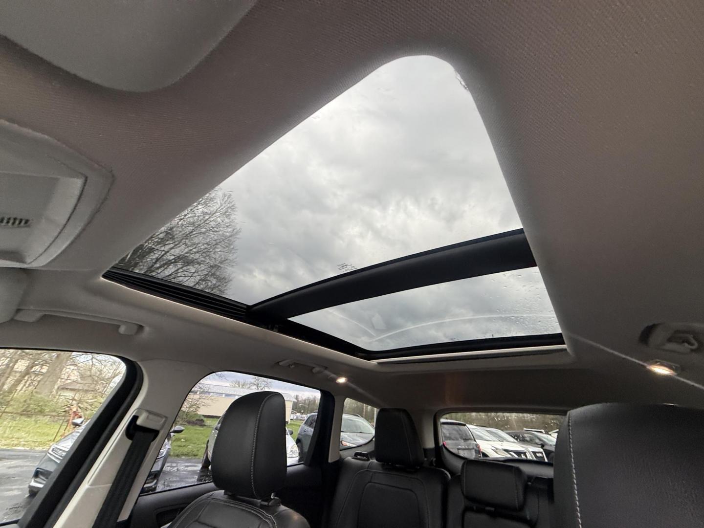 2018 Gray /Black Ford Escape SEL 4WD (1FMCU9HD0JU) with an 1.5L I4 DOHC 16V engine, Automatic transmission, located at 11115 Chardon Rd. , Chardon, OH, 44024, (440) 214-9705, 41.580246, -81.241943 - 2018 Ford Escape SEL 4WD – Turbo Efficiency, Premium Comfort, and All-Weather Confidence! This sharp 2018 Ford Escape SEL 4WD is a great-looking compact crossover that delivers style, comfort, and real capability! Powered by a responsive 1.5L I4 Turbocharged EcoBoost engine paired with a smooth 6 - Photo#19