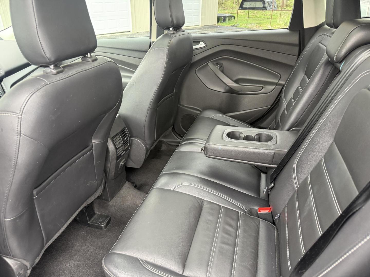 2018 Gray /Black Ford Escape SEL 4WD (1FMCU9HD0JU) with an 1.5L I4 DOHC 16V engine, Automatic transmission, located at 11115 Chardon Rd. , Chardon, OH, 44024, (440) 214-9705, 41.580246, -81.241943 - 2018 Ford Escape SEL 4WD – Turbo Efficiency, Premium Comfort, and All-Weather Confidence! This sharp 2018 Ford Escape SEL 4WD is a great-looking compact crossover that delivers style, comfort, and real capability! Powered by a responsive 1.5L I4 Turbocharged EcoBoost engine paired with a smooth 6 - Photo#21