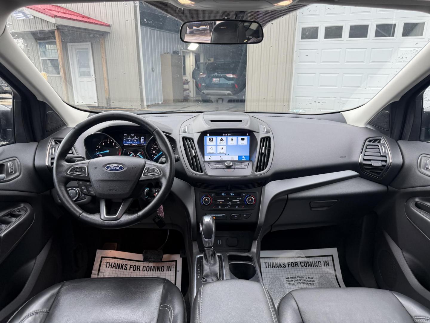 2018 Gray /Black Ford Escape SEL 4WD (1FMCU9HD0JU) with an 1.5L I4 DOHC 16V engine, Automatic transmission, located at 11115 Chardon Rd. , Chardon, OH, 44024, (440) 214-9705, 41.580246, -81.241943 - 2018 Ford Escape SEL 4WD – Turbo Efficiency, Premium Comfort, and All-Weather Confidence! This sharp 2018 Ford Escape SEL 4WD is a great-looking compact crossover that delivers style, comfort, and real capability! Powered by a responsive 1.5L I4 Turbocharged EcoBoost engine paired with a smooth 6 - Photo#23