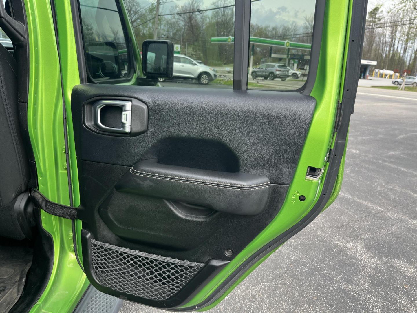 2018 Jeep Wrangler JK Unlimited Sahara (1C4HJXEG7JW) with an 3.6L V6 DOHC 24V FFV engine, 6A transmission, located at 547 E. Main St., Orwell, OH, 44076, (440) 437-5893, 41.535435, -80.847855 - Photo#33