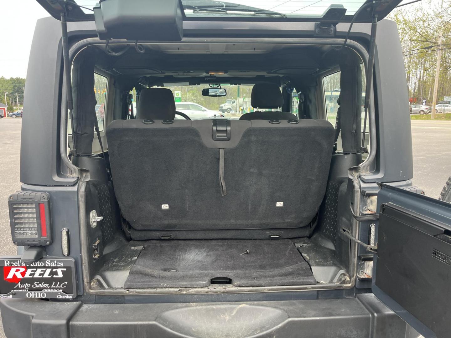 2016 Jeep Wrangler Sport 4WD (1C4AJWAG4GL) with an 3.6L V6 DOHC 24V FFV engine, located at 547 E. Main St., Orwell, OH, 44076, (440) 437-5893, 41.535435, -80.847855 - Photo#13