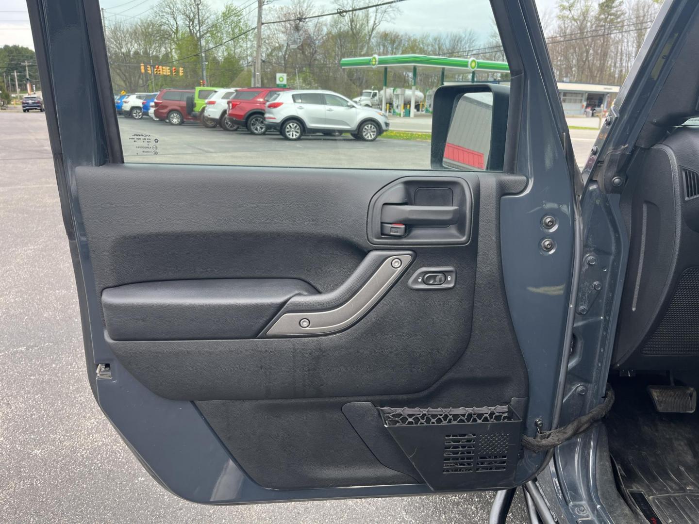 2016 Jeep Wrangler Sport 4WD (1C4AJWAG4GL) with an 3.6L V6 DOHC 24V FFV engine, located at 547 E. Main St., Orwell, OH, 44076, (440) 437-5893, 41.535435, -80.847855 - Photo#15