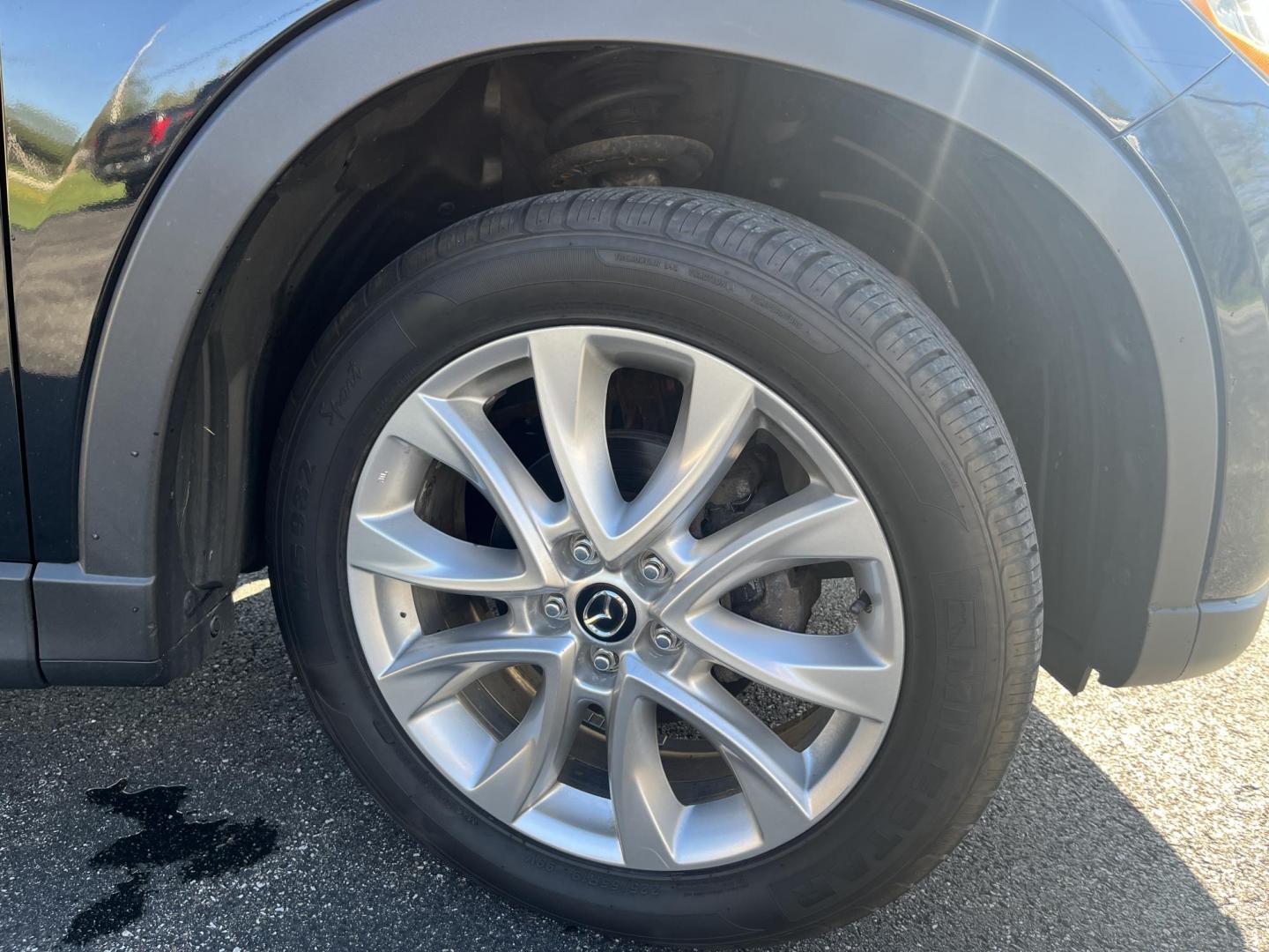 2015 Mazda CX-5 Grand Touring AWD (JM3KE4DY1F0) with an 2.5L L4 DOHC 16V engine, 6-Speed Automatic transmission, located at 547 E. Main St., Orwell, OH, 44076, (440) 437-5893, 41.535435, -80.847855 - Photo#4