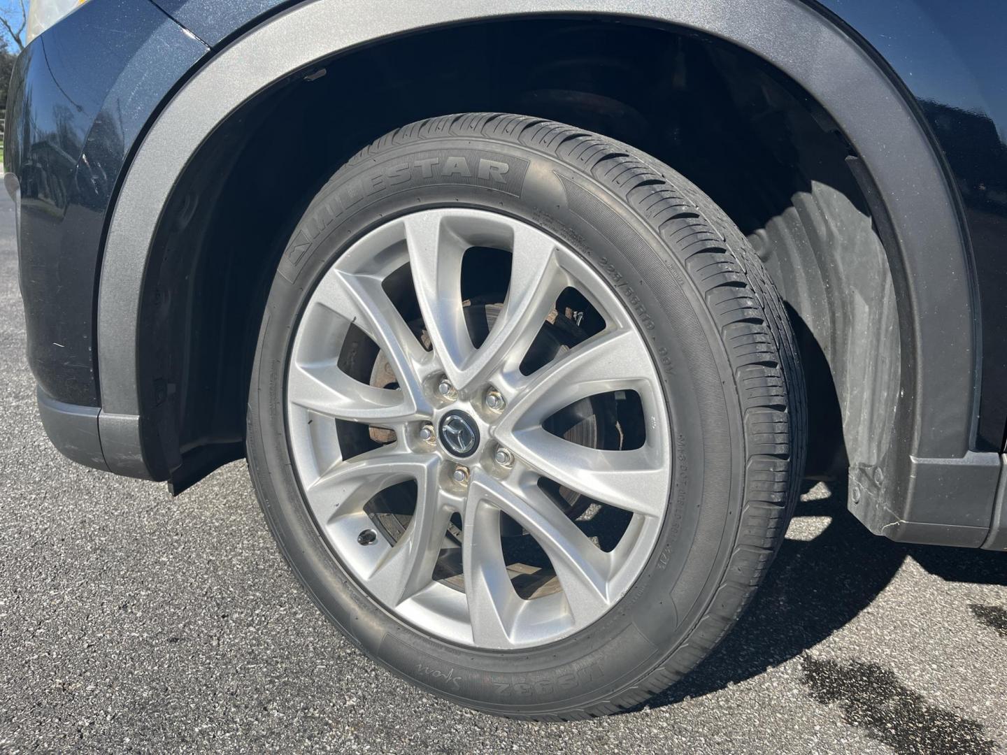 2015 Mazda CX-5 Grand Touring AWD (JM3KE4DY1F0) with an 2.5L L4 DOHC 16V engine, 6-Speed Automatic transmission, located at 547 E. Main St., Orwell, OH, 44076, (440) 437-5893, 41.535435, -80.847855 - Photo#12