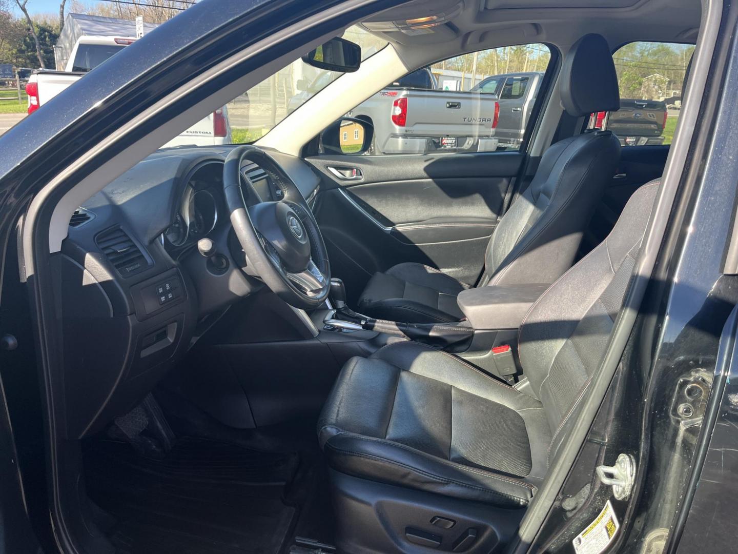 2015 Mazda CX-5 Grand Touring AWD (JM3KE4DY1F0) with an 2.5L L4 DOHC 16V engine, 6-Speed Automatic transmission, located at 547 E. Main St., Orwell, OH, 44076, (440) 437-5893, 41.535435, -80.847855 - Photo#17