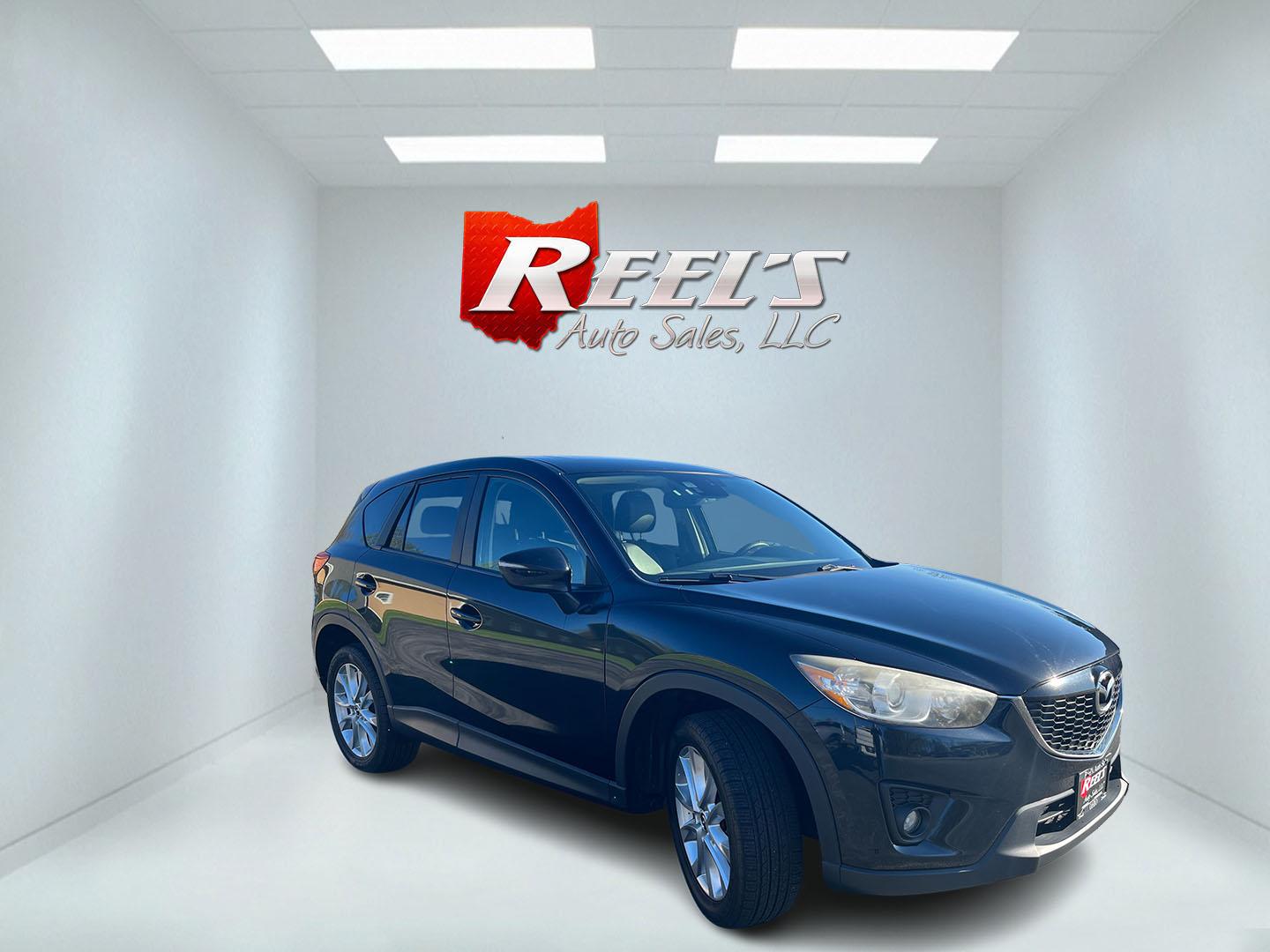 2015 Mazda CX-5 Grand Touring AWD (JM3KE4DY1F0) with an 2.5L L4 DOHC 16V engine, 6-Speed Automatic transmission, located at 547 E. Main St., Orwell, OH, 44076, (440) 437-5893, 41.535435, -80.847855 - Photo#2