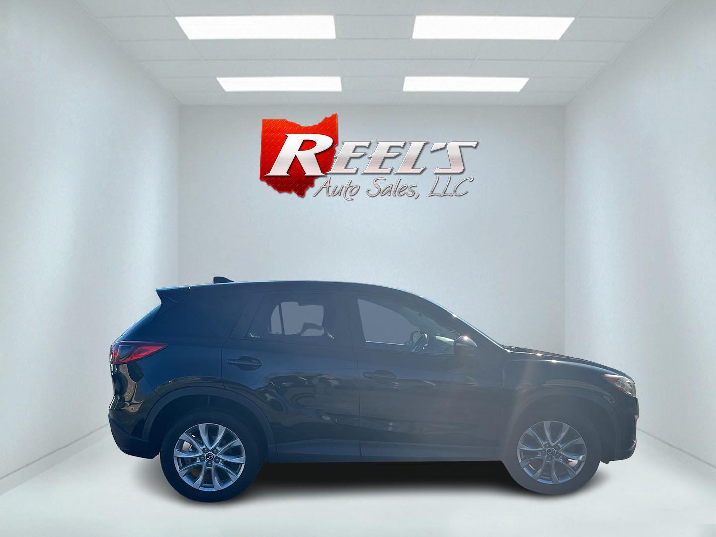 2015 Mazda CX-5 Grand Touring AWD (JM3KE4DY1F0) with an 2.5L L4 DOHC 16V engine, 6-Speed Automatic transmission, located at 547 E. Main St., Orwell, OH, 44076, (440) 437-5893, 41.535435, -80.847855 - Photo#5
