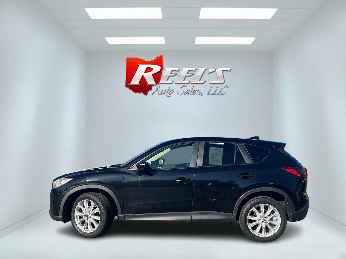 2015 Mazda CX-5 Grand Touring AWD (JM3KE4DY1F0) with an 2.5L L4 DOHC 16V engine, 6-Speed Automatic transmission, located at 547 E. Main St., Orwell, OH, 44076, (440) 437-5893, 41.535435, -80.847855 - Photo#11