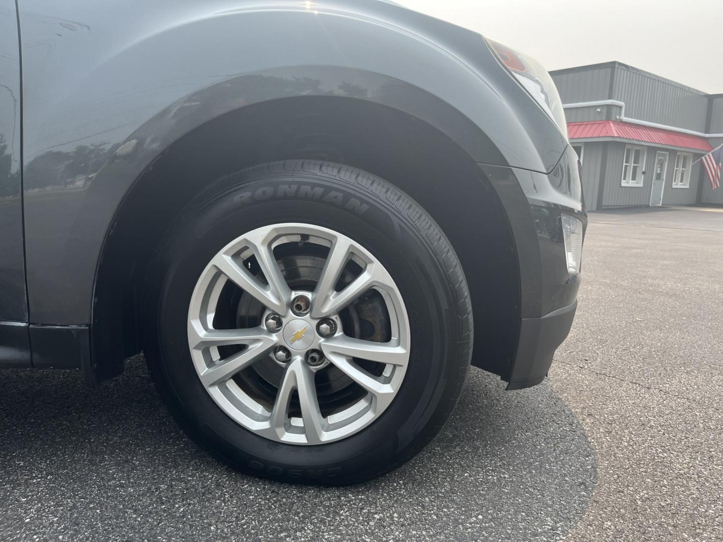 2017 Gray /Black Chevrolet Equinox LT 2WD (2GNALCEK0H1) with an 2.4L L4 DOHC 16V engine, Automatic transmission, located at 11115 Chardon Rd. , Chardon, OH, 44024, (440) 214-9705, 41.580246, -81.241943 - 2017 Chevrolet Equinox LT FWD – Ergonomic, Efficient, and Comfortable Daily Driver! This 2017 Chevrolet Equinox LT FWD is a sharp, well-equipped compact SUV that offers great value and everyday practicality! Powered by the reliable 2.4L EcoTec I4 engine paired with a smooth 6-speed automatic tran- Photo#4