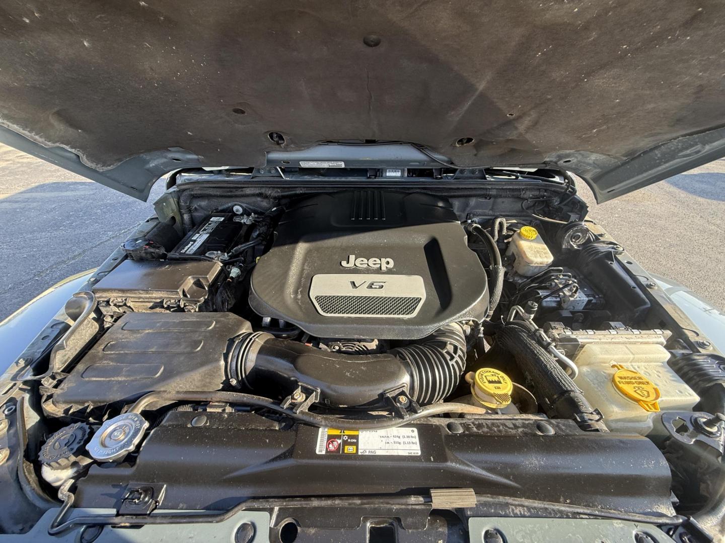 2014 Gray /Black Jeep Wrangler Sahara 4WD (1C4AJWBG6EL) with an 3.6L V6 DOHC 24V FFV engine, located at 547 E. Main St., Orwell, OH, 44076, (440) 437-5893, 41.535435, -80.847855 - Photo#7