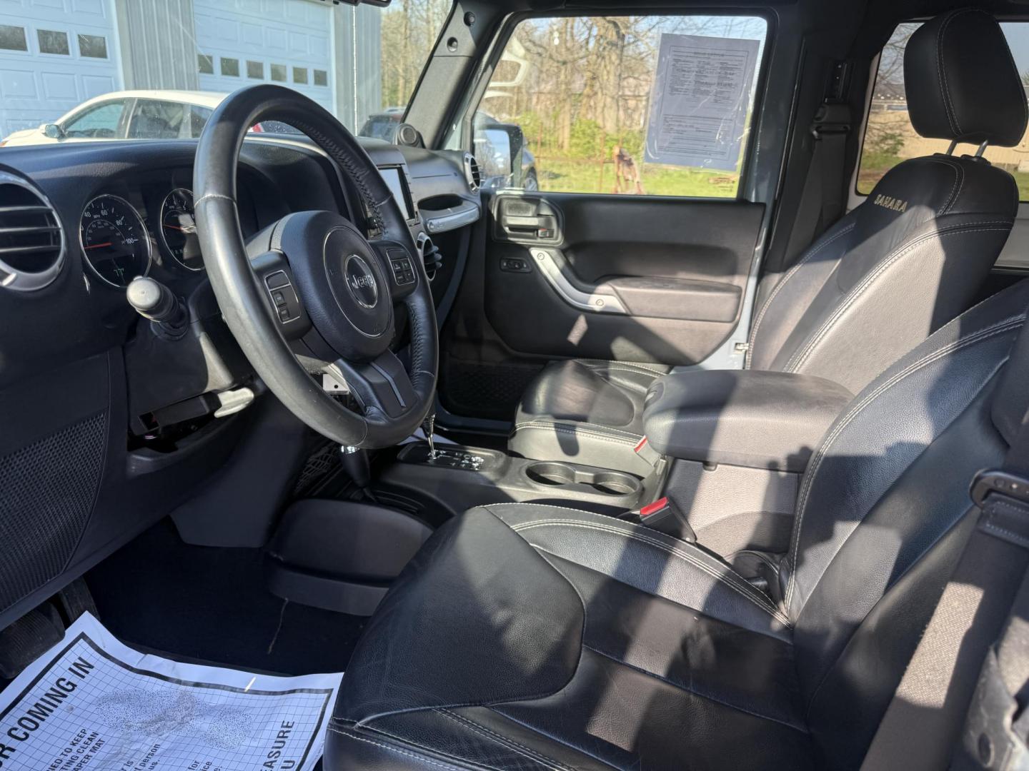 2014 Gray /Black Jeep Wrangler Sahara 4WD (1C4AJWBG6EL) with an 3.6L V6 DOHC 24V FFV engine, located at 547 E. Main St., Orwell, OH, 44076, (440) 437-5893, 41.535435, -80.847855 - Photo#8