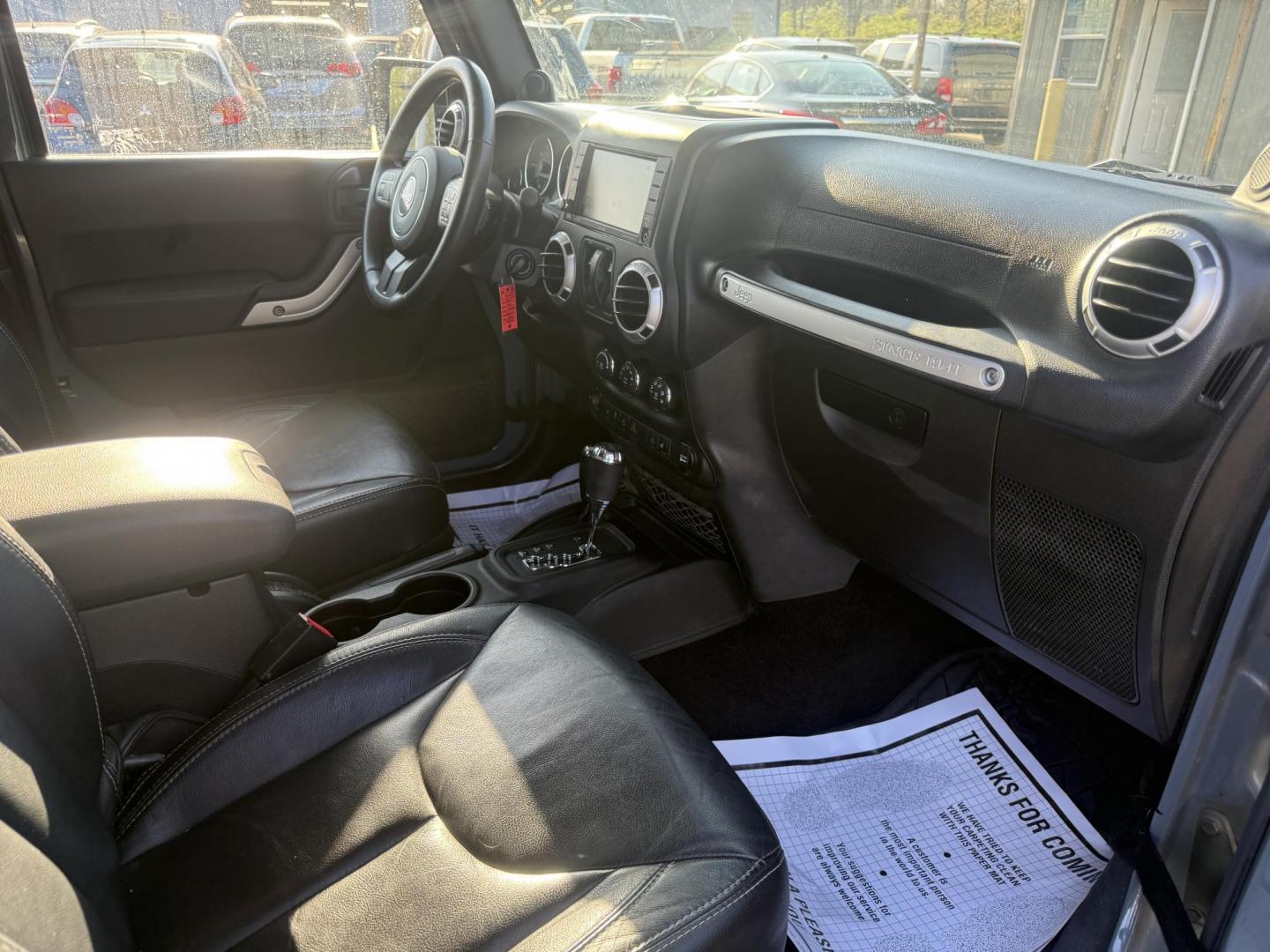 2014 Gray /Black Jeep Wrangler Sahara 4WD (1C4AJWBG6EL) with an 3.6L V6 DOHC 24V FFV engine, located at 547 E. Main St., Orwell, OH, 44076, (440) 437-5893, 41.535435, -80.847855 - Photo#37