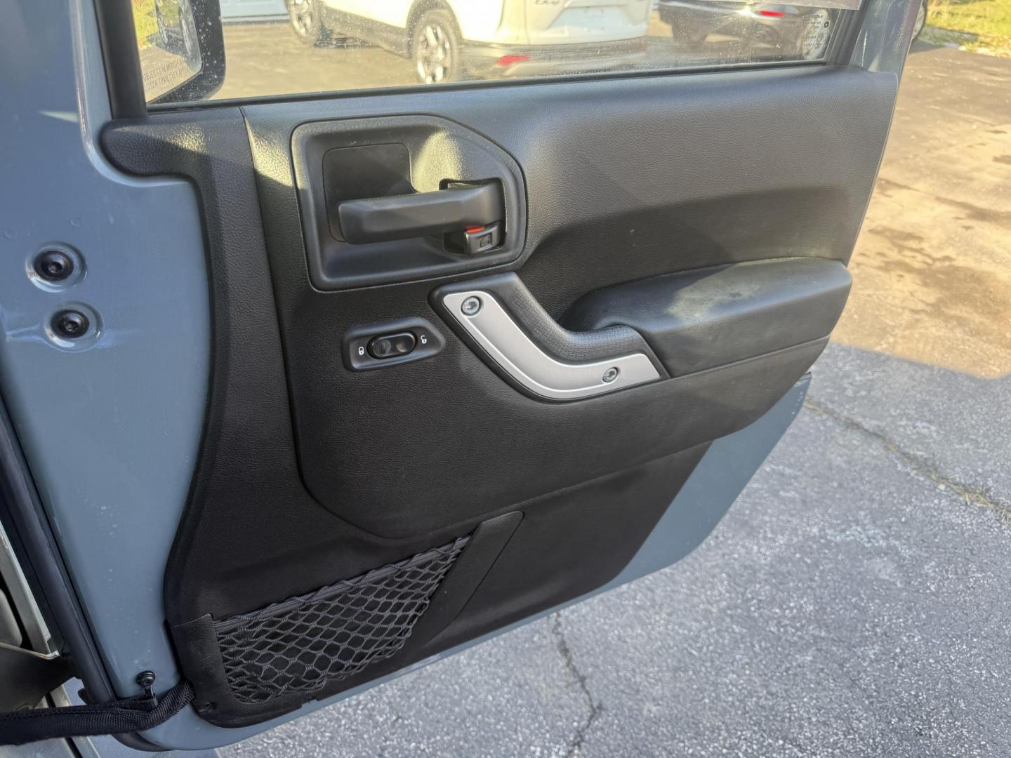 2014 Gray /Black Jeep Wrangler Sahara 4WD (1C4AJWBG6EL) with an 3.6L V6 DOHC 24V FFV engine, located at 547 E. Main St., Orwell, OH, 44076, (440) 437-5893, 41.535435, -80.847855 - Photo#39