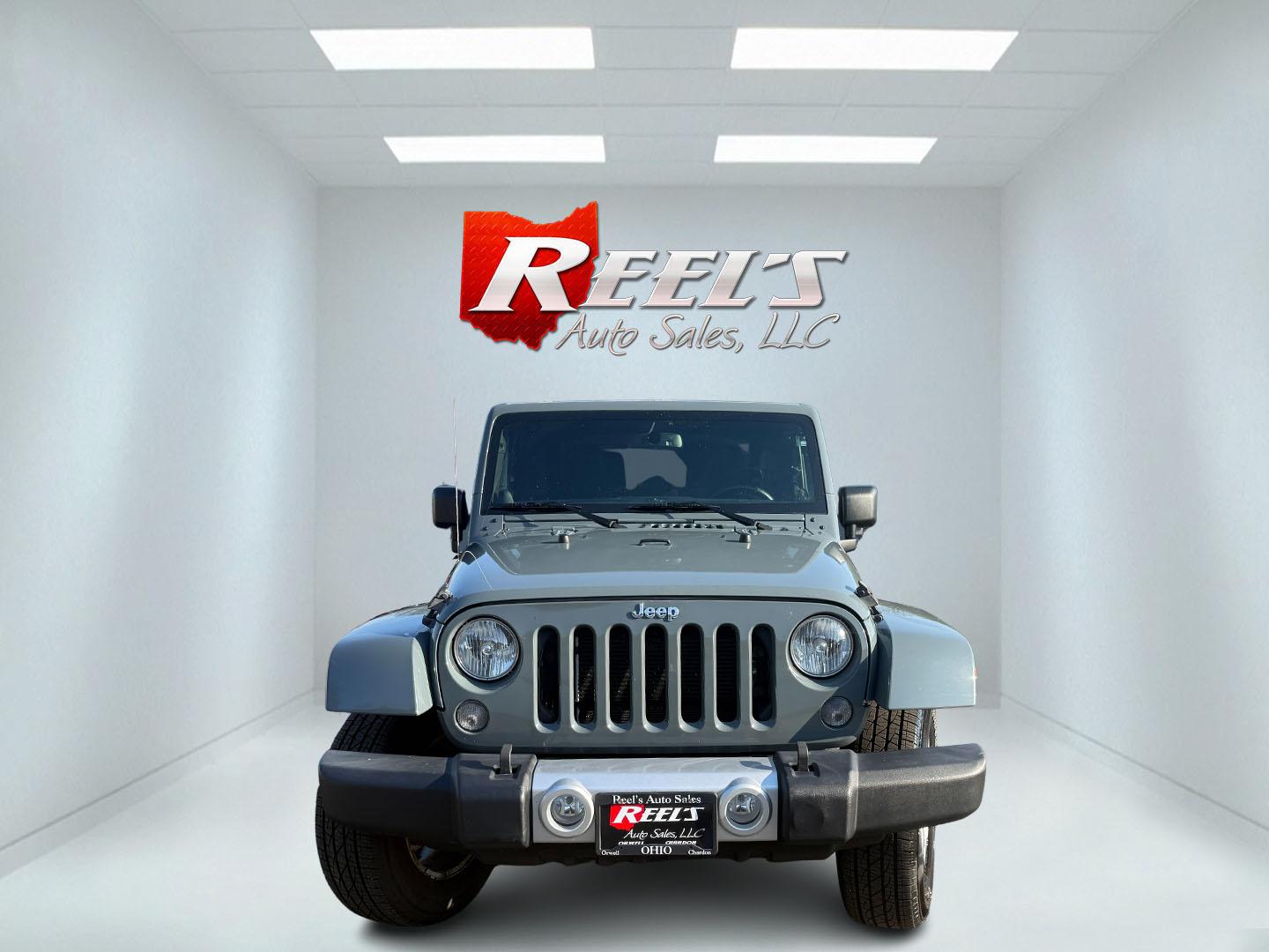 2014 Gray /Black Jeep Wrangler Sahara 4WD (1C4AJWBG6EL) with an 3.6L V6 DOHC 24V FFV engine, located at 547 E. Main St., Orwell, OH, 44076, (440) 437-5893, 41.535435, -80.847855 - Photo#1