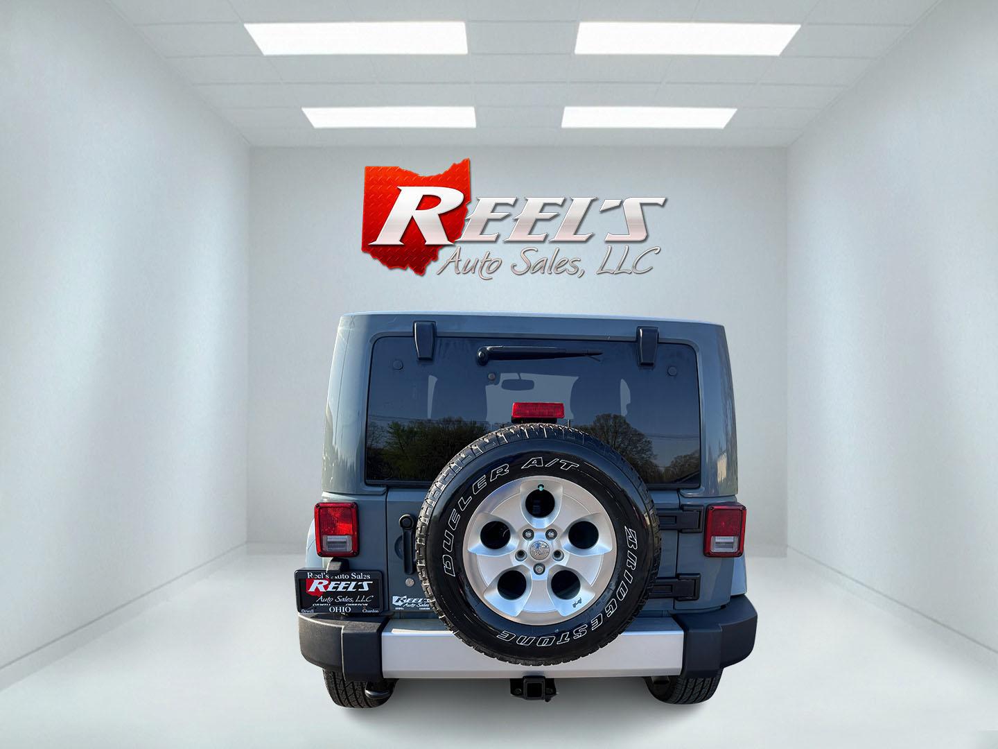 2014 Gray /Black Jeep Wrangler Sahara 4WD (1C4AJWBG6EL) with an 3.6L V6 DOHC 24V FFV engine, located at 547 E. Main St., Orwell, OH, 44076, (440) 437-5893, 41.535435, -80.847855 - Photo#26