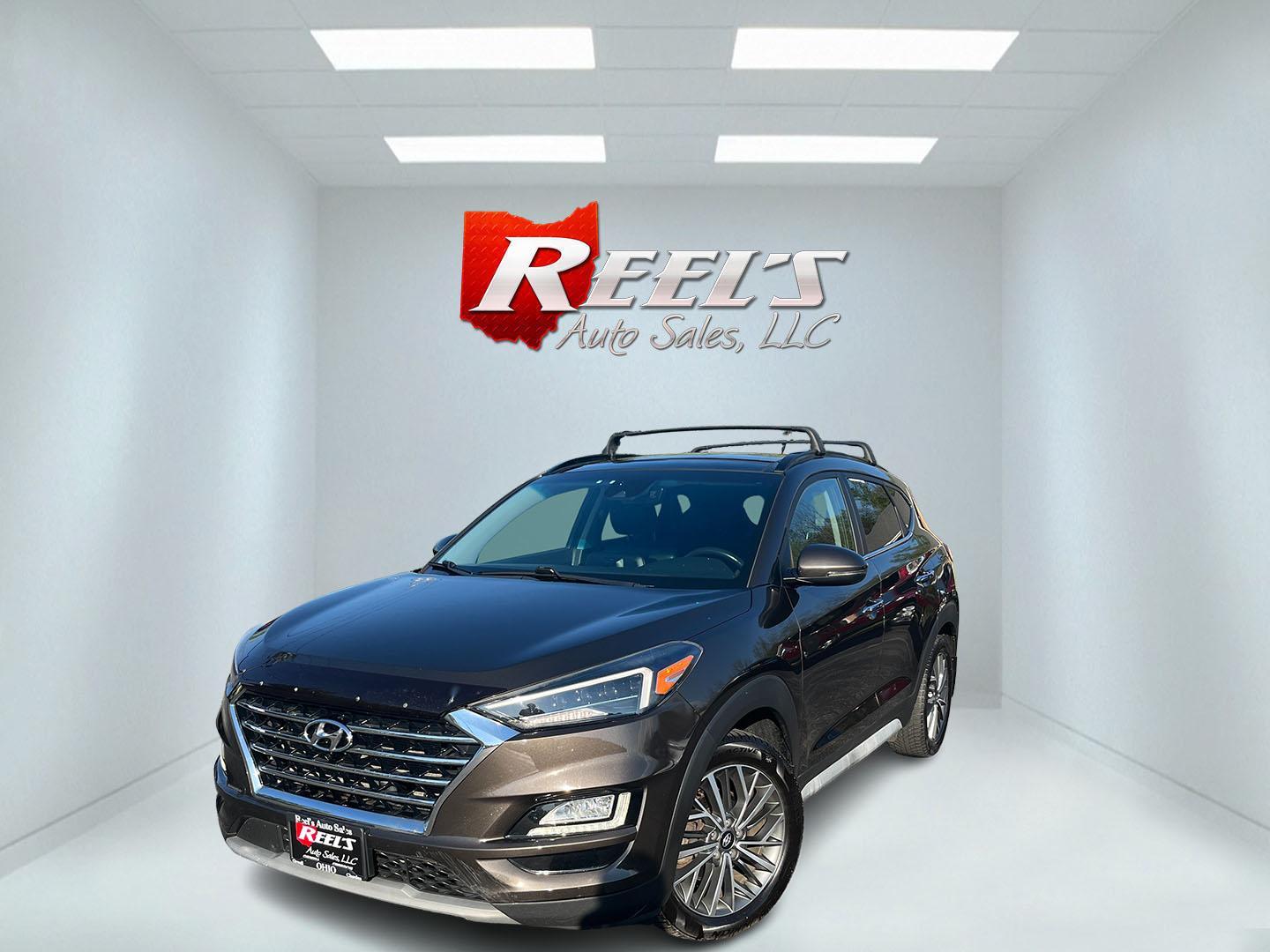 2020 Brown /Black Hyundai Tucson Ultimate AWD (KM8J3CAL2LU) with an 2.4L I4 DOHC 16V engine, Automatic transmission, located at 547 E. Main St., Orwell, OH, 44076, (440) 437-5893, 41.535435, -80.847855 - 2020 Hyundai Tucson Ultimate AWD – Top-Tier Luxury Compact SUV with Premium Features! This loaded 2020 Hyundai Tucson Ultimate AWD is the fully-optioned top trim that offers near-luxury comfort, advanced safety, and confident all-weather performance! Powered by a smooth 2.4L I4 GDI engine paired - Photo#0