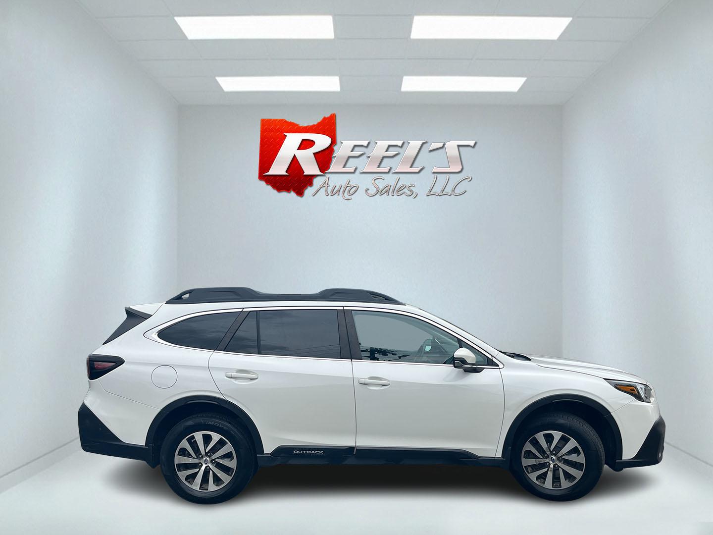 2021 White /Black Subaru Outback Premium (4S4BTACC8M3) with an 2.5L H4 DOHC 16V engine, CVT transmission, located at 11115 Chardon Rd. , Chardon, OH, 44024, (440) 214-9705, 41.580246, -81.241943 - 2021 Subaru Outback Premium AWD – Versatile Adventure Wagon with EyeSight Safety and Excellent Efficiency! This 2021 Subaru Outback Premium AWD is the perfect blend of rugged capability, upscale comfort, and modern technology. Powered by Subaru’s reliable 2.5L H4 engine paired with the legendar - Photo#5