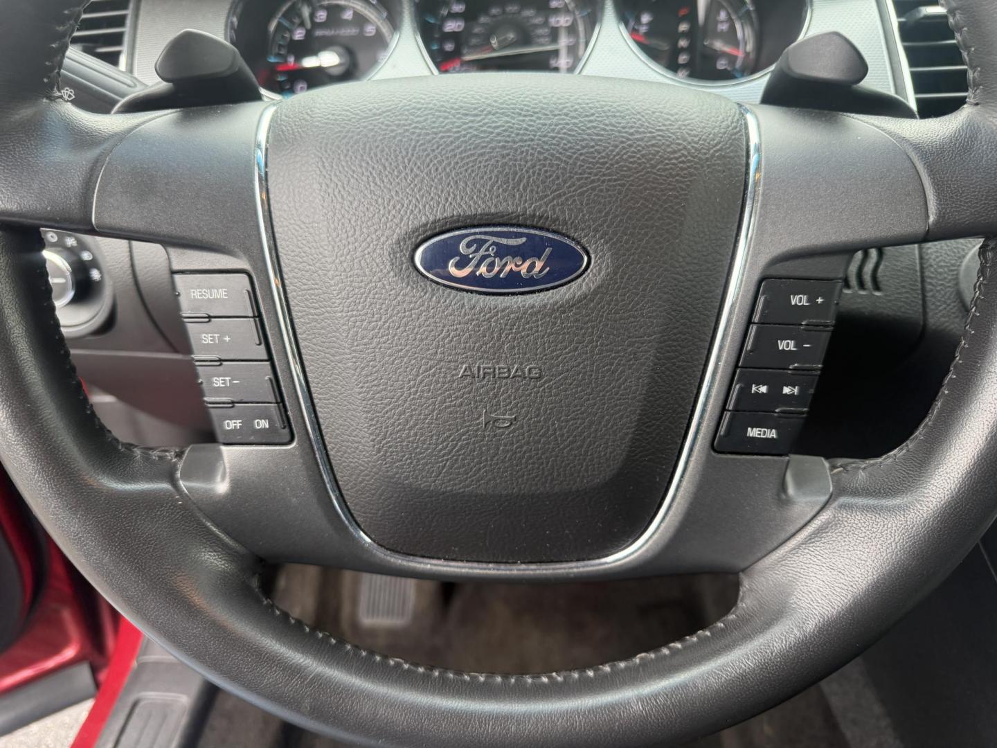 2012 Red /Black Ford Taurus SEL FWD (1FAHP2EWXCG) with an 3.5L V6 DOHC 24V engine, 6-Speed Automatic transmission, located at 11115 Chardon Rd. , Chardon, OH, 44024, (440) 214-9705, 41.580246, -81.241943 - 2012 Ford Taurus SEL FWD – Smooth, Spacious, and Efficient Full-Size Sedan! This 2012 Ford Taurus SEL FWD is a comfortable, well-equipped full-size sedan that offers roomy seating, smooth performance, and solid efficiency. Powered by a strong 3.5L V6 engine paired with a smooth 6-speed automatic - Photo#12