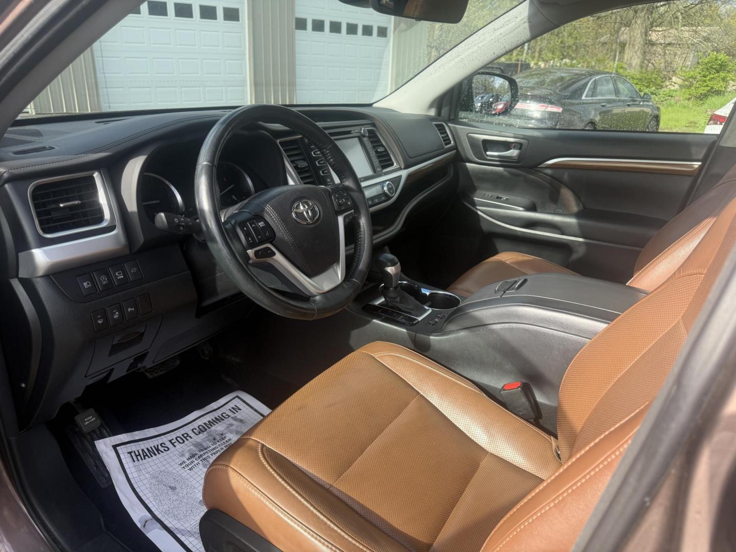 2017 Brown /Brown Toyota Highlander Limited Platinum AWD V6 (5TDDZRFH5HS) with an 3.5L V6 DOHC 24V engine, Automatic transmission, located at 547 E. Main St., Orwell, OH, 44076, (440) 437-5893, 41.535435, -80.847855 - 2017 Toyota Highlander Limited Platinum AWD – Top-Tier Luxury 3-Row SUV with Premium Features and Strong Towing! This loaded 2017 Toyota Highlander Limited Platinum AWD is the ultimate upscale family hauler. Powered by the smooth 3.5L D-4S V6 engine paired with a reliable 6-speed automatic transm - Photo#5