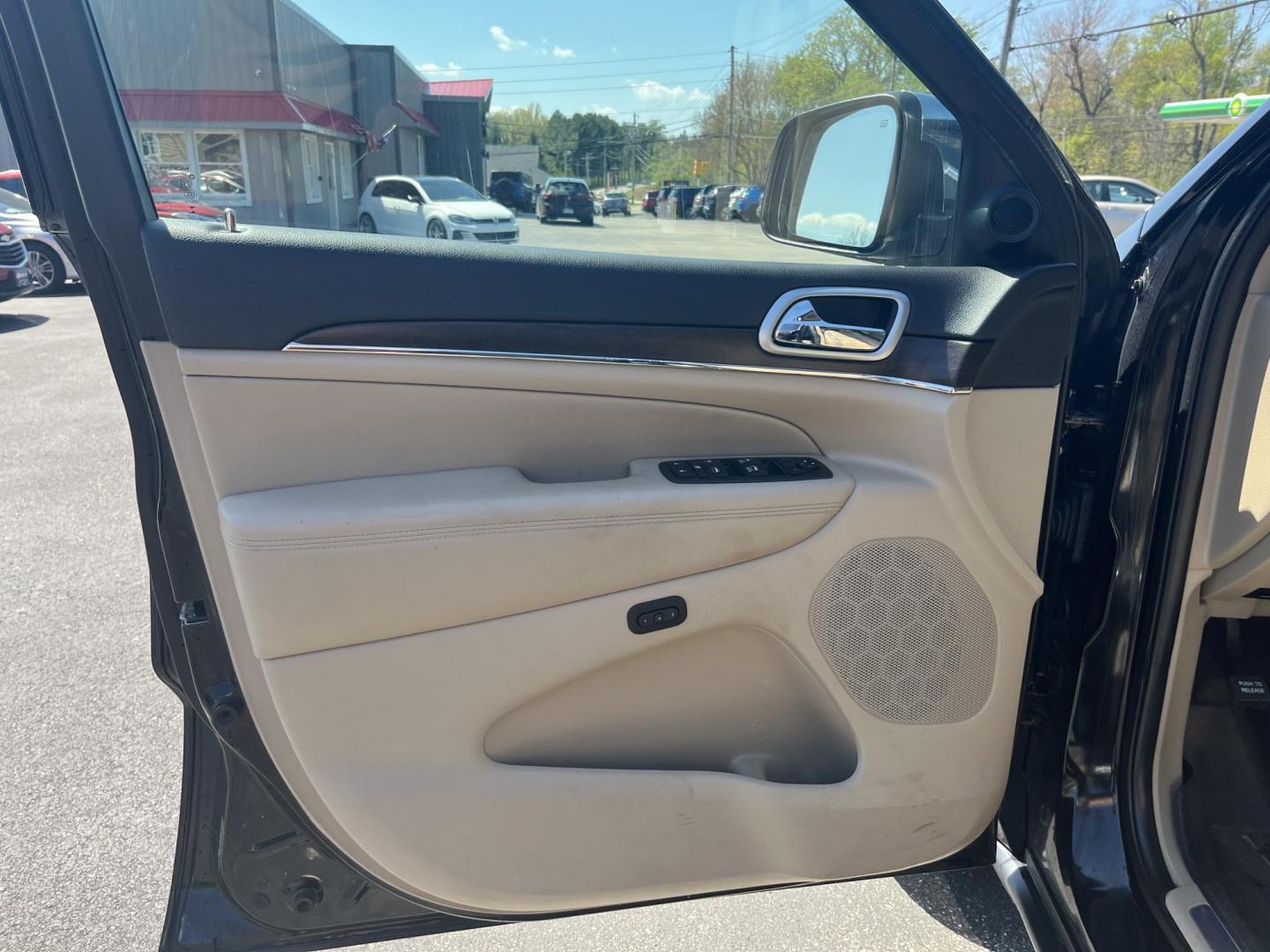 2018 Black /Tan Jeep Grand Cherokee Limited 4WD (1C4RJFBG4JC) with an 3.6L V6 DOHC 24V engine, Automatic transmission, located at 11115 Chardon Rd. , Chardon, OH, 44024, (440) 214-9705, 41.580246, -81.241943 - 2018 Jeep Grand Cherokee Limited 4WD – Loaded Luxury with Off-Road Adventure Group and Premium Comfort! This 2018 Jeep Grand Cherokee Limited 4WD is a beautifully equipped midsize SUV that combines upscale luxury with serious capability. Powered by the smooth 3.6L Pentastar V6 engine paired with - Photo#16