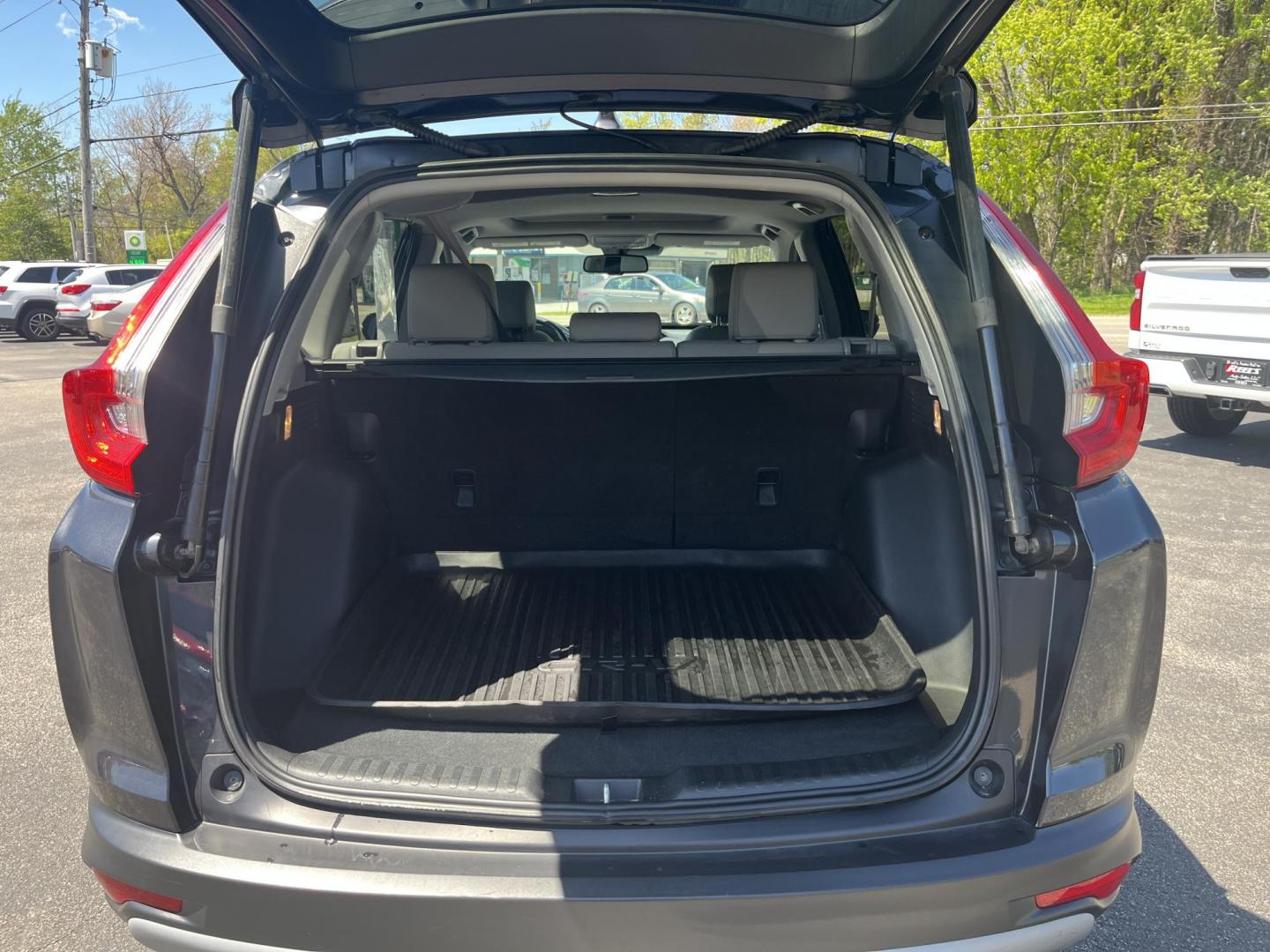 2019 Gray Honda CR-V EX-L AWD (2HKRW2H84KH) with an 1.5L I4 16V DOHC TURBO engine, Automatic transmission, located at 11115 Chardon Rd. , Chardon, OH, 44024, (440) 214-9705, 41.580246, -81.241943 - 2019 Honda CR-V EX-L AWD – Premium Turbo Crossover with Leather, Safety, and Outstanding Efficiency! This 2019 Honda CR-V EX-L AWD is a top-tier compact SUV that delivers luxury comfort, strong performance, and excellent efficiency. Powered by a responsive 1.5L Turbocharged Earth Dreams I4 engine - Photo#14