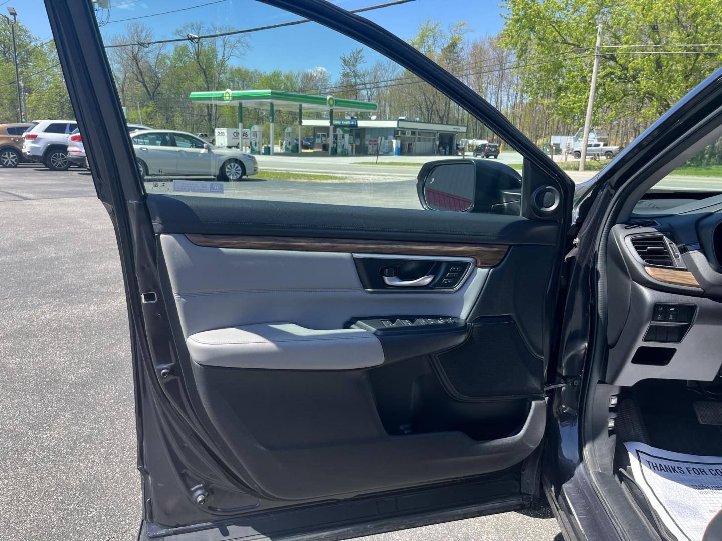 2019 Gray Honda CR-V EX-L AWD (2HKRW2H84KH) with an 1.5L I4 16V DOHC TURBO engine, Automatic transmission, located at 11115 Chardon Rd. , Chardon, OH, 44024, (440) 214-9705, 41.580246, -81.241943 - 2019 Honda CR-V EX-L AWD – Premium Turbo Crossover with Leather, Safety, and Outstanding Efficiency! This 2019 Honda CR-V EX-L AWD is a top-tier compact SUV that delivers luxury comfort, strong performance, and excellent efficiency. Powered by a responsive 1.5L Turbocharged Earth Dreams I4 engine - Photo#16