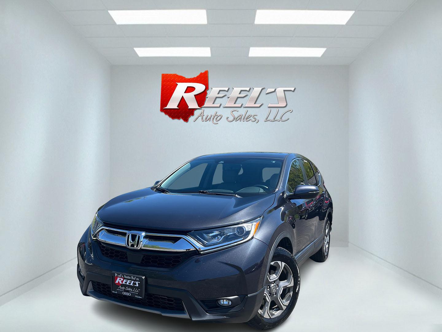 2019 Gray Honda CR-V EX-L AWD (2HKRW2H84KH) with an 1.5L I4 16V DOHC TURBO engine, Automatic transmission, located at 11115 Chardon Rd. , Chardon, OH, 44024, (440) 214-9705, 41.580246, -81.241943 - 2019 Honda CR-V EX-L AWD – Premium Turbo Crossover with Leather, Safety, and Outstanding Efficiency! This 2019 Honda CR-V EX-L AWD is a top-tier compact SUV that delivers luxury comfort, strong performance, and excellent efficiency. Powered by a responsive 1.5L Turbocharged Earth Dreams I4 engine - Photo#0