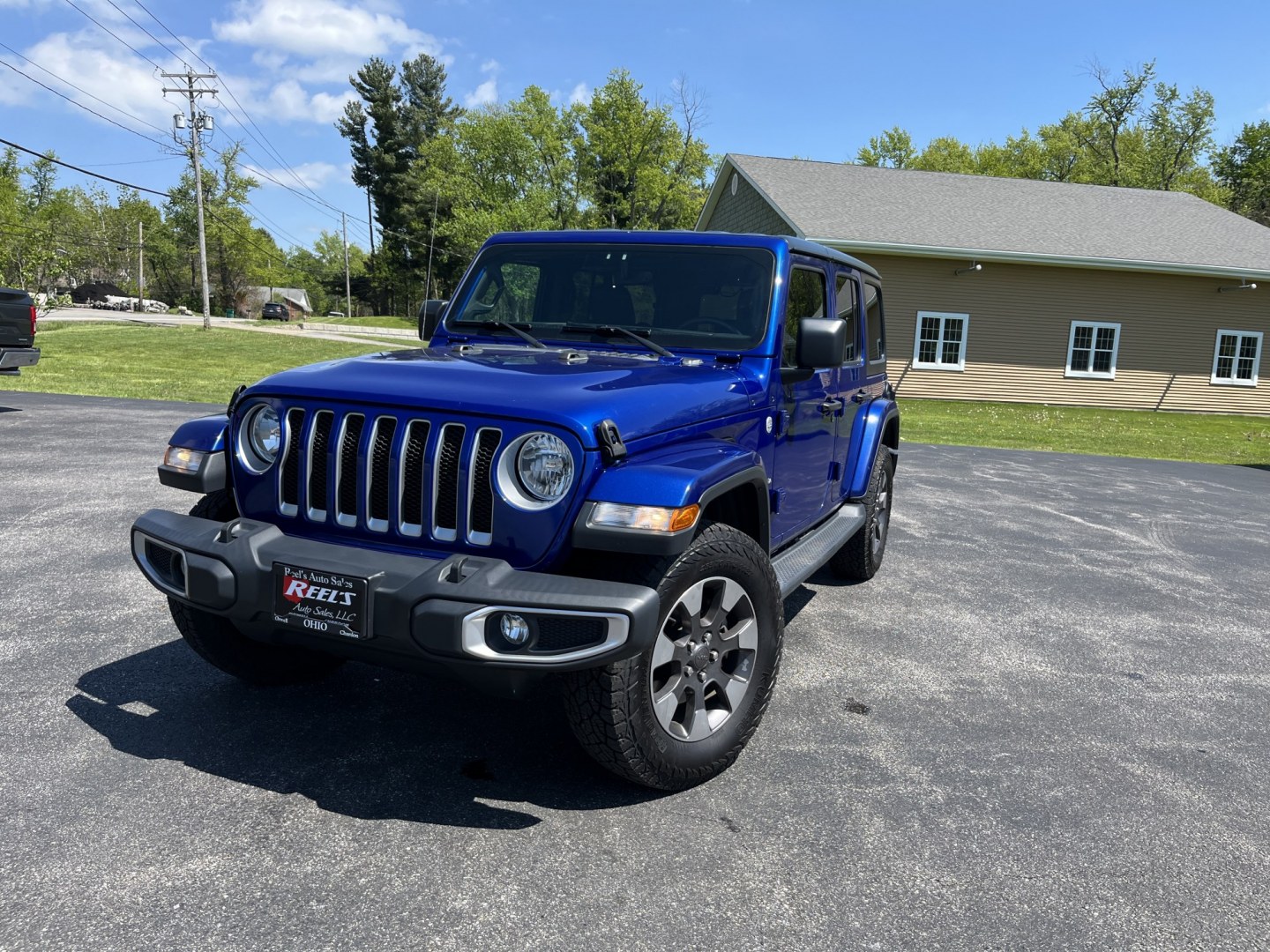 2018 Jeep Wrangler Unlimited Sahara (1C4HJXEN8JW) with an 2.0L L4 DOHC 16V TURBO engine, 6A transmission, located at 547 E. Main St., Orwell, OH, 44076, (440) 437-5893, 41.535435, -80.847855 - Photo#0