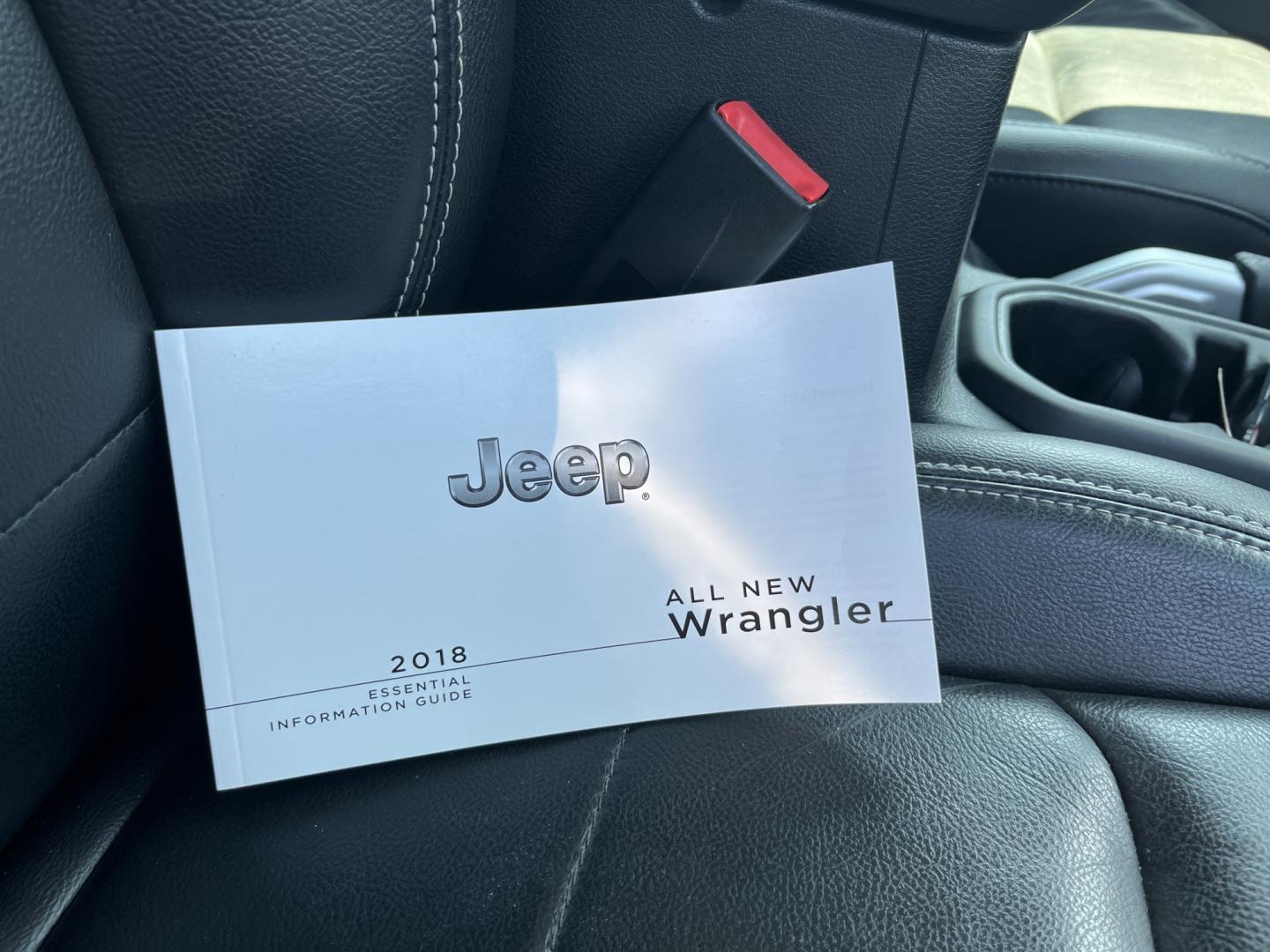 2018 Jeep Wrangler Unlimited Sahara (1C4HJXEN8JW) with an 2.0L L4 DOHC 16V TURBO engine, 6A transmission, located at 547 E. Main St., Orwell, OH, 44076, (440) 437-5893, 41.535435, -80.847855 - Photo#35