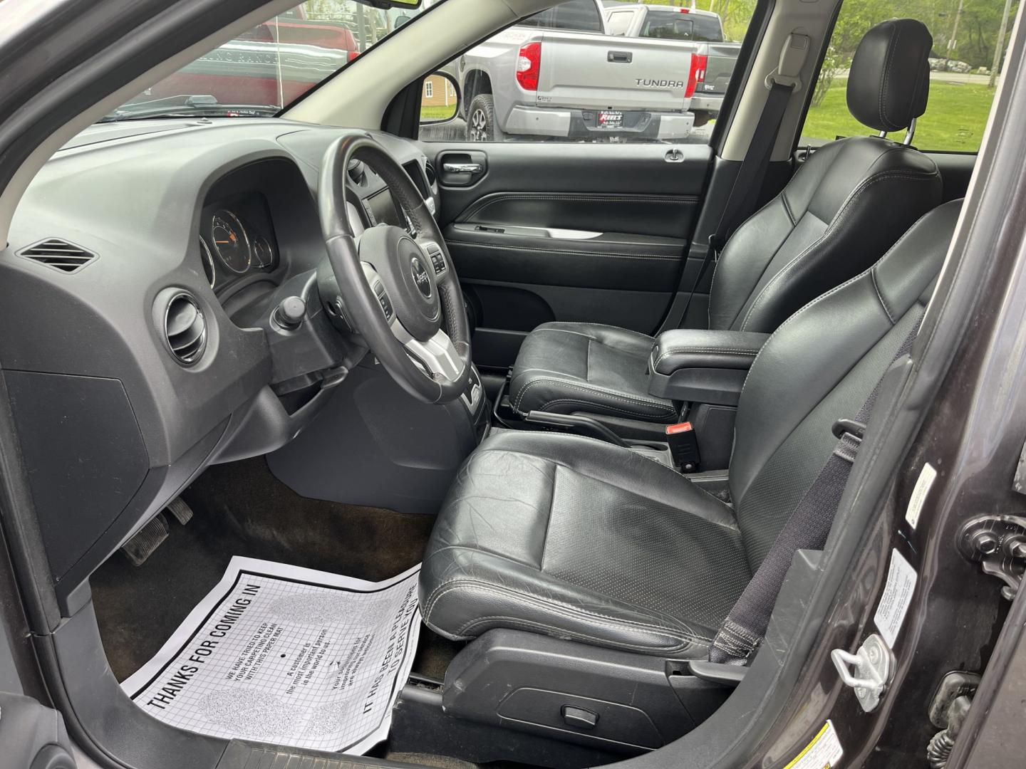 2016 Gray /Black Jeep Compass High Altitude 4WD (1C4NJDEB2GD) with an 2.4L I4 DOHC 16V engine, Automatic transmission, located at 11115 Chardon Rd. , Chardon, OH, 44024, (440) 214-9705, 41.580246, -81.241943 - 2016 Jeep Compass High Altitude 4WD – Premium Leather, Sunroof, and All-Weather Capability! This 2016 Jeep Compass High Altitude 4WD is a sharp, well-equipped compact SUV that offers upscale comfort with real Jeep capability. Powered by a reliable 2.4L I4 engine paired with a smooth 6-speed autom - Photo#17