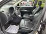 2016 Gray /Black Jeep Compass High Altitude 4WD (1C4NJDEB2GD) with an 2.4L I4 DOHC 16V engine, Automatic transmission, located at 11115 Chardon Rd. , Chardon, OH, 44024, (440) 214-9705, 41.580246, -81.241943 - 2016 Jeep Compass High Altitude 4WD – Premium Leather, Sunroof, and All-Weather Capability! This 2016 Jeep Compass High Altitude 4WD is a sharp, well-equipped compact SUV that offers upscale comfort with real Jeep capability. Powered by a reliable 2.4L I4 engine paired with a smooth 6-speed autom - Photo#17