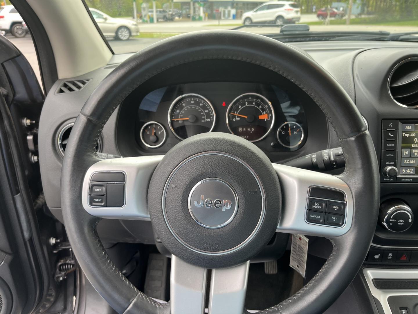 2016 Gray /Black Jeep Compass High Altitude 4WD (1C4NJDEB2GD) with an 2.4L I4 DOHC 16V engine, Automatic transmission, located at 11115 Chardon Rd. , Chardon, OH, 44024, (440) 214-9705, 41.580246, -81.241943 - 2016 Jeep Compass High Altitude 4WD – Premium Leather, Sunroof, and All-Weather Capability! This 2016 Jeep Compass High Altitude 4WD is a sharp, well-equipped compact SUV that offers upscale comfort with real Jeep capability. Powered by a reliable 2.4L I4 engine paired with a smooth 6-speed autom - Photo#18
