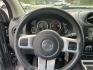 2016 Gray /Black Jeep Compass High Altitude 4WD (1C4NJDEB2GD) with an 2.4L I4 DOHC 16V engine, Automatic transmission, located at 11115 Chardon Rd. , Chardon, OH, 44024, (440) 214-9705, 41.580246, -81.241943 - 2016 Jeep Compass High Altitude 4WD – Premium Leather, Sunroof, and All-Weather Capability! This 2016 Jeep Compass High Altitude 4WD is a sharp, well-equipped compact SUV that offers upscale comfort with real Jeep capability. Powered by a reliable 2.4L I4 engine paired with a smooth 6-speed autom - Photo#18