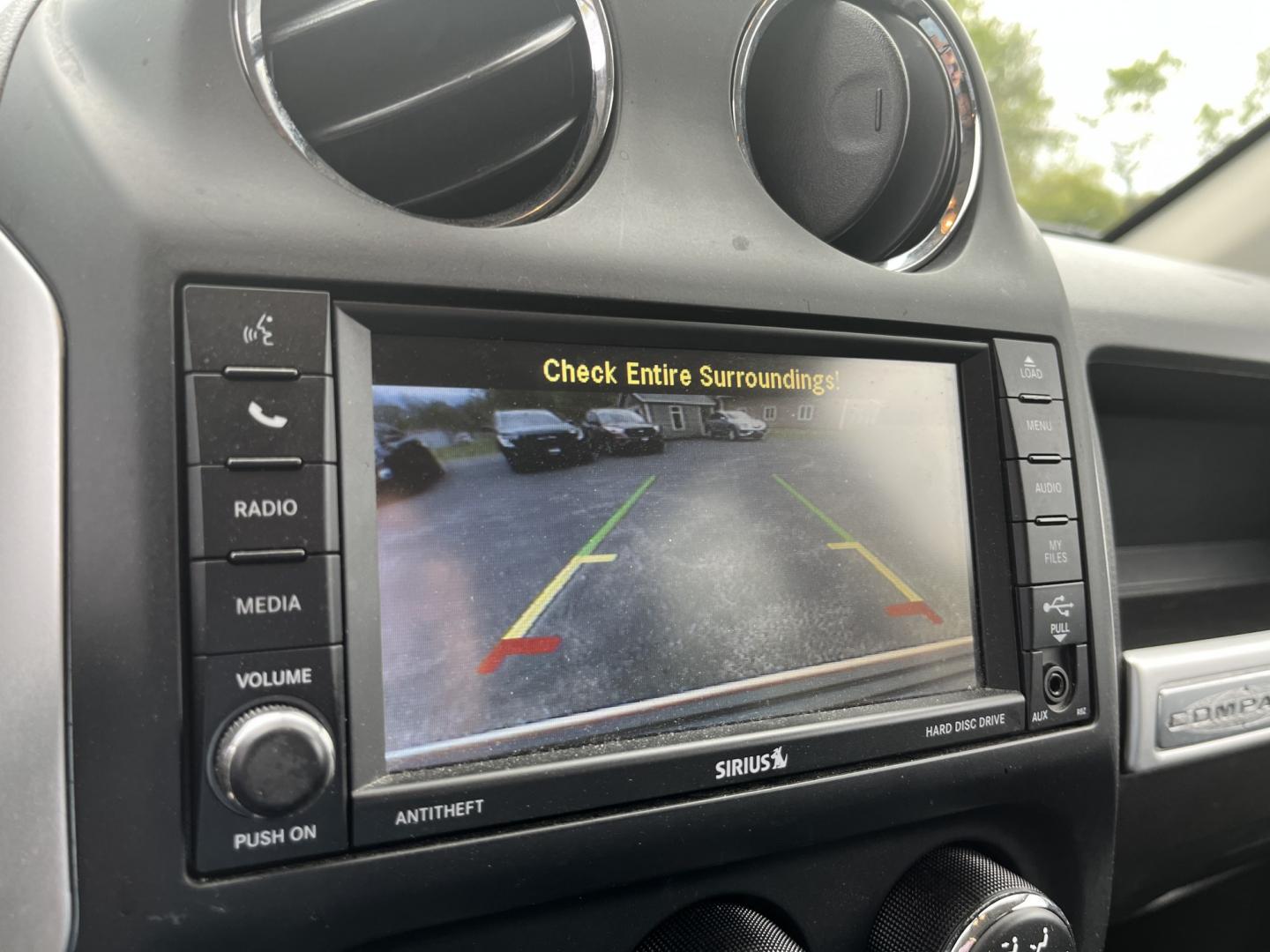 2016 Gray /Black Jeep Compass High Altitude 4WD (1C4NJDEB2GD) with an 2.4L I4 DOHC 16V engine, Automatic transmission, located at 11115 Chardon Rd. , Chardon, OH, 44024, (440) 214-9705, 41.580246, -81.241943 - 2016 Jeep Compass High Altitude 4WD – Premium Leather, Sunroof, and All-Weather Capability! This 2016 Jeep Compass High Altitude 4WD is a sharp, well-equipped compact SUV that offers upscale comfort with real Jeep capability. Powered by a reliable 2.4L I4 engine paired with a smooth 6-speed autom - Photo#23