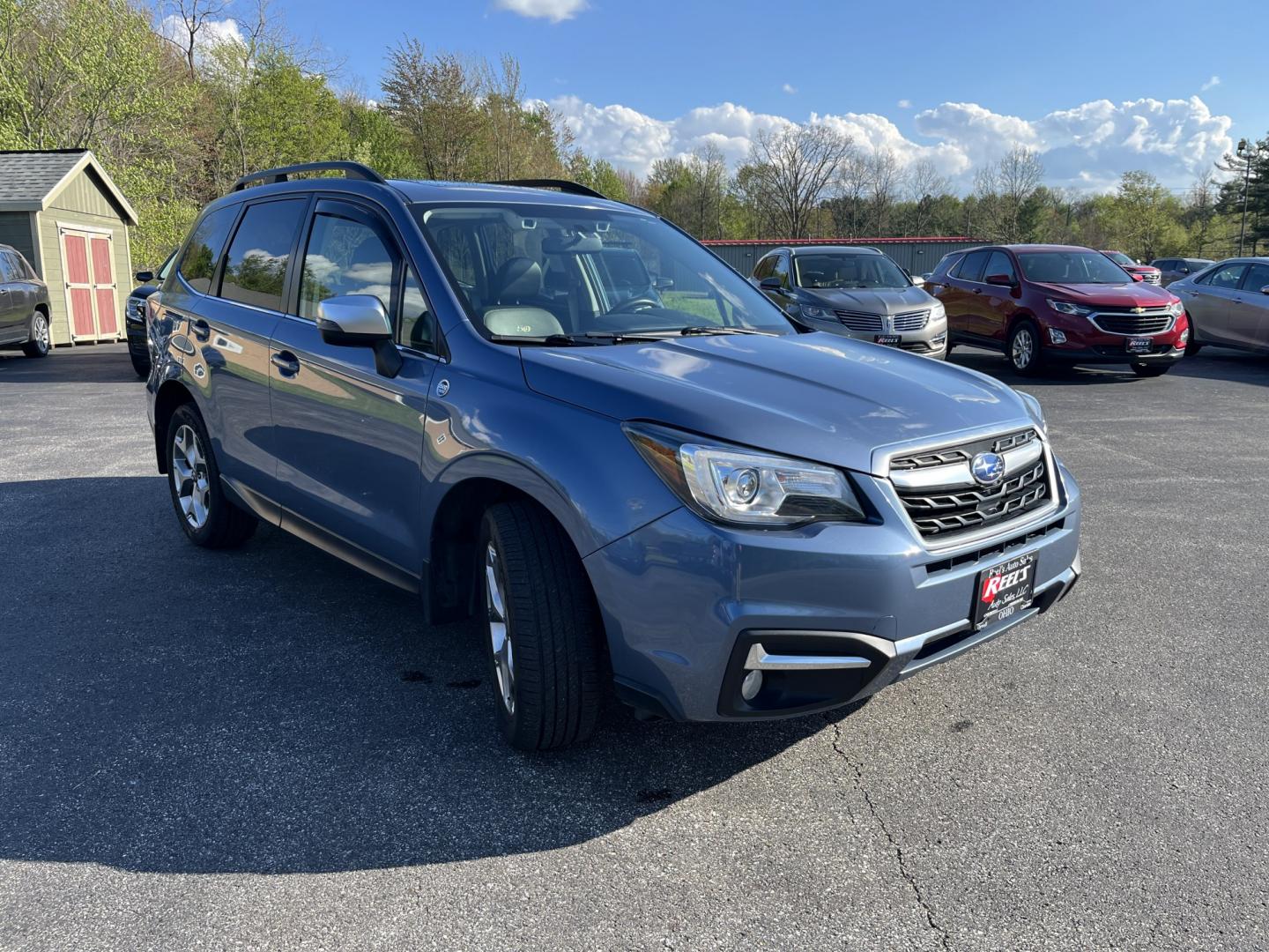 2018 Subaru Forester 2.5i Touring (JF2SJAWCXJH) with an 2.5L H4 SOHC 16V engine, CVT transmission, located at 547 E. Main St., Orwell, OH, 44076, (440) 437-5893, 41.535435, -80.847855 - Photo#2