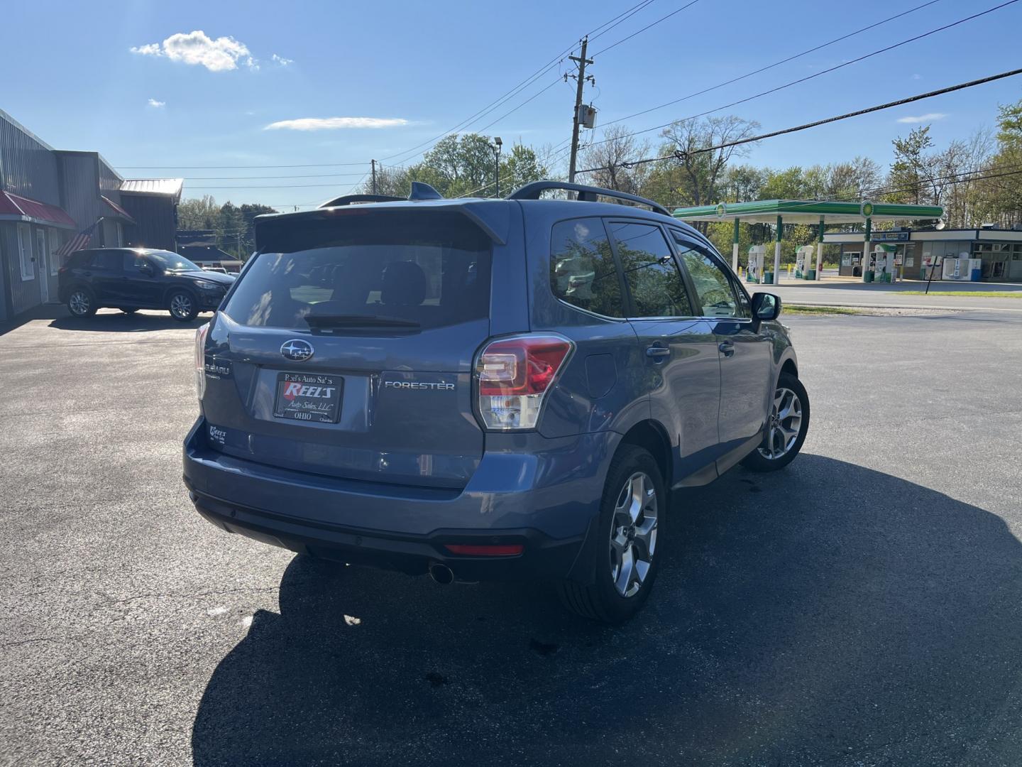 2018 Subaru Forester 2.5i Touring (JF2SJAWCXJH) with an 2.5L H4 SOHC 16V engine, CVT transmission, located at 547 E. Main St., Orwell, OH, 44076, (440) 437-5893, 41.535435, -80.847855 - Photo#6