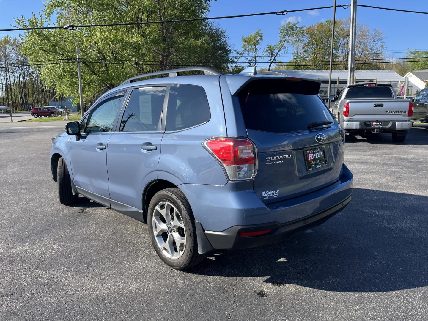 2018 Subaru Forester 2.5i Touring (JF2SJAWCXJH) with an 2.5L H4 SOHC 16V engine, CVT transmission, located at 547 E. Main St., Orwell, OH, 44076, (440) 437-5893, 41.535435, -80.847855 - Photo#9