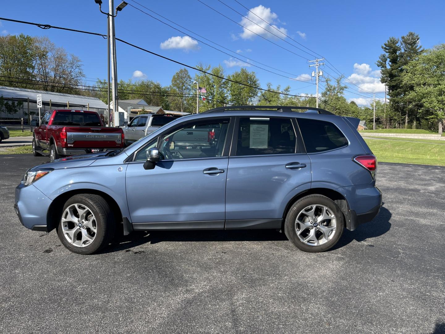 2018 Subaru Forester 2.5i Touring (JF2SJAWCXJH) with an 2.5L H4 SOHC 16V engine, CVT transmission, located at 547 E. Main St., Orwell, OH, 44076, (440) 437-5893, 41.535435, -80.847855 - Photo#11