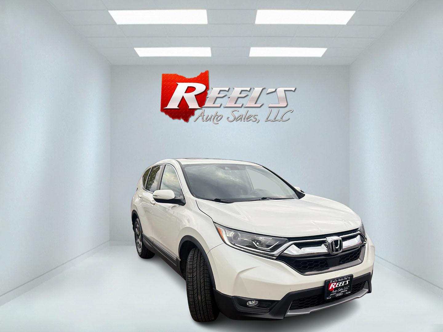 2017 White /Black Honda CR-V EX AWD (5J6RW2H52HL) with an 1.5L I4 16V DOHC TURBO engine, Automatic transmission, located at 547 E. Main St., Orwell, OH, 44076, (440) 437-5893, 41.535435, -80.847855 - 2017 Honda CR-V EX AWD – Turbo Efficiency, Loaded Safety, and Premium Features! This 2017 Honda CR-V EX AWD is a fantastic compact crossover that combines efficiency, comfort, and top-tier safety features. Powered by a responsive 1.5L Turbocharged Earth Dreams I4 engine paired with a smooth CVT t - Photo#2