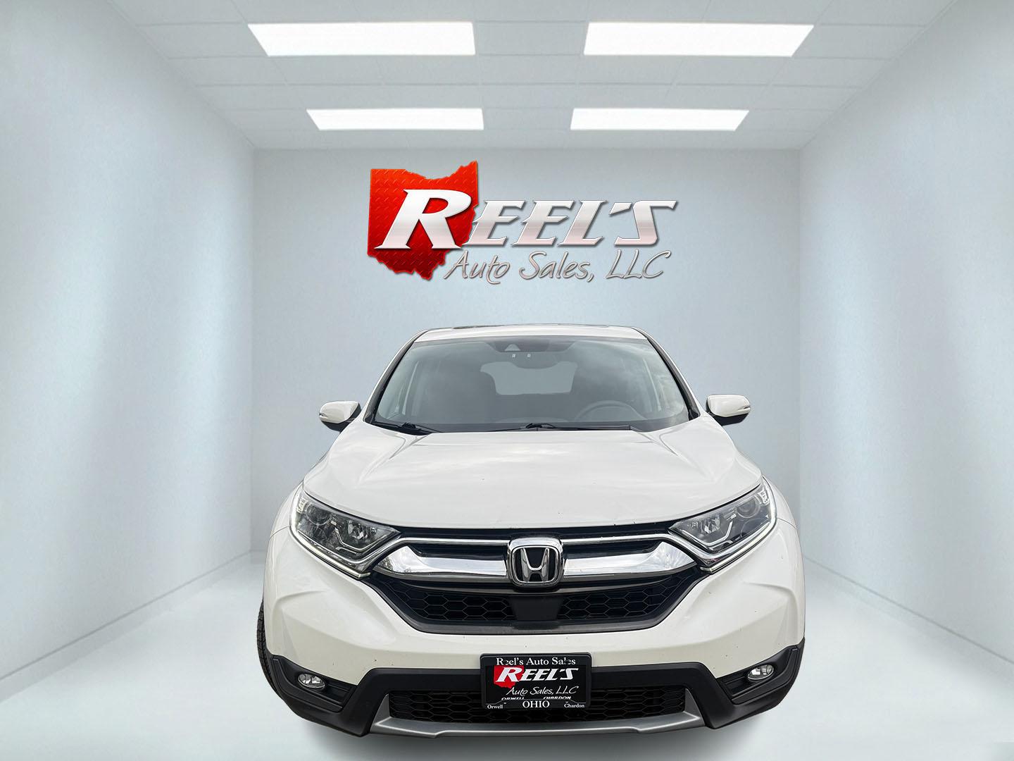 2017 White /Black Honda CR-V EX AWD (5J6RW2H52HL) with an 1.5L I4 16V DOHC TURBO engine, Automatic transmission, located at 547 E. Main St., Orwell, OH, 44076, (440) 437-5893, 41.535435, -80.847855 - 2017 Honda CR-V EX AWD – Turbo Efficiency, Loaded Safety, and Premium Features! This 2017 Honda CR-V EX AWD is a fantastic compact crossover that combines efficiency, comfort, and top-tier safety features. Powered by a responsive 1.5L Turbocharged Earth Dreams I4 engine paired with a smooth CVT t - Photo#1