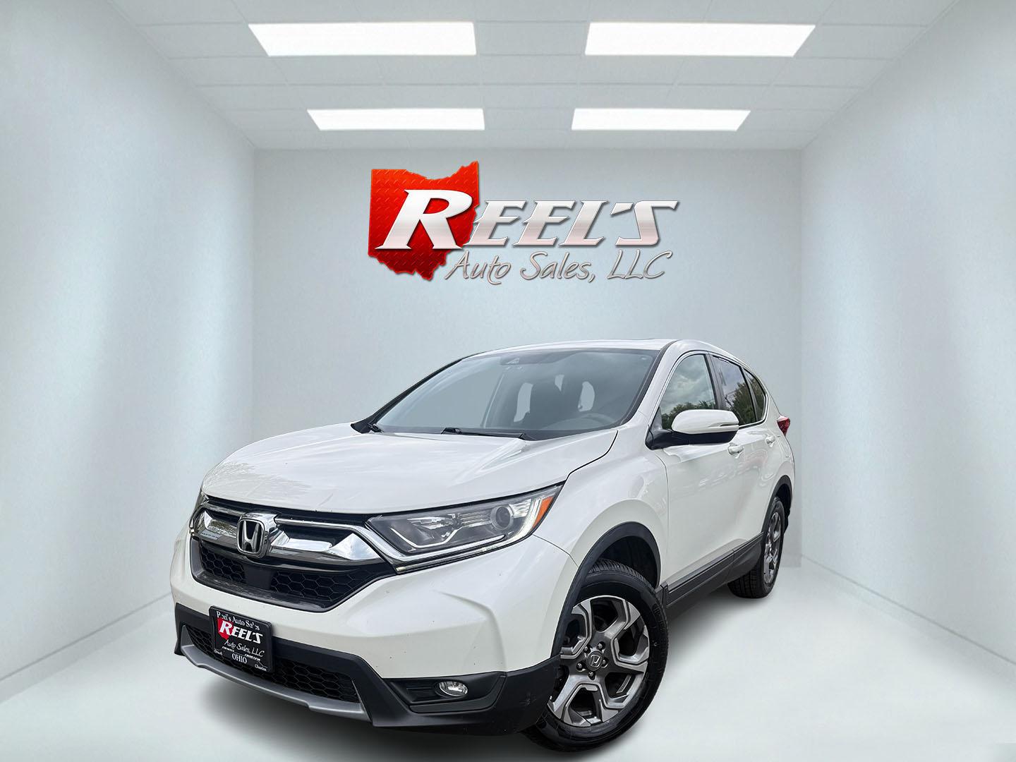 2017 White /Black Honda CR-V EX AWD (5J6RW2H52HL) with an 1.5L I4 16V DOHC TURBO engine, Automatic transmission, located at 547 E. Main St., Orwell, OH, 44076, (440) 437-5893, 41.535435, -80.847855 - 2017 Honda CR-V EX AWD – Turbo Efficiency, Loaded Safety, and Premium Features! This 2017 Honda CR-V EX AWD is a fantastic compact crossover that combines efficiency, comfort, and top-tier safety features. Powered by a responsive 1.5L Turbocharged Earth Dreams I4 engine paired with a smooth CVT t - Photo#0